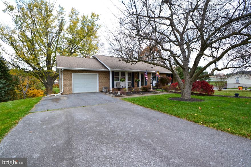 Welcome to this meticulously maintained 3-bedroom, 2.5-bathroom rancher with new carpet in bedrooms, a true gem nestled in the heart of Westminster, MD. Boasting an impressive 2,816 square feet of living space, this home, located at 20 Pleasant Valley Rd, Westminster, MD 21158, combines classic comfort with modern elegance.

As you step inside, you're greeted by gleaming hardwood floors that extend throughout the home, setting the stage for a warm and inviting atmosphere. The pride of ownership is immediately evident, reflecting over 40 years of loving care.

The heart of this home is its spacious first-floor primary bedroom, complete with an attached bathroom, offering a perfect blend of convenience and privacy. The finished basement, featuring a cozy fireplace and an additional bathroom, provides a versatile space for relaxation, entertainment, or a home office.

Entertain or unwind on the large Trek deck, overlooking a lush green backyard that sits on almost an acre of serene land. The natural beauty of the outdoors creates a tranquil retreat for those who appreciate privacy and nature.

Other notable features include a convenient attached garage, durable aluminum siding, and a reliable shingle roof. Built in 1973, this home has stood the test of time with its solid construction and thoughtful upkeep.

Located in the highly desirable area of Westminster, MD, this property offers the perfect balance of peaceful living and convenient access to local amenities. Don't miss the opportunity to make this house your forever home, where decades of memories await to be created.