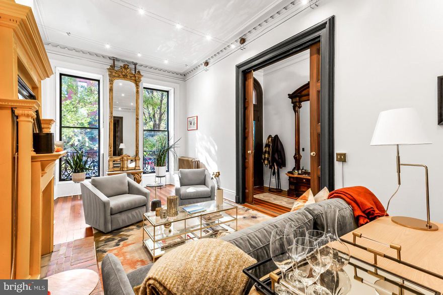 MULTIPLE OFFERS. Quintessential Bolton Hill Victorian with all the bells and whistles! Enjoy dedicated garage parking with your very own two car garage with space to park your new electric vehicle. Oh my, so many original details here including ornate mantels, pier mirror, massive hall mirror, unique crown moldings, zebra striped wood floors, rear service staircase and more. The main level has an open floor plan with a large double living room, dining room with original light shaft, and modern gourmet kitchen for your inner chef to play with a Viking Stove and SubZero refrigerator, sexy powder room, butler’s pantry and annex room that could be a home office, playroom, or plant conservatory. The second floor has a luxurious primary suite with an en-suite bath with a large spa-like walk-in shower and separate water closet. At the rear is another large bedroom with built-ins and full bath. The third floor has two additional bedrooms, a full bath and a second kitchen. This floor has unlimited possibilities for an in-law, au-pair or possible rental. The lower level is unfinished but would make an ideal home gym, home theater, art studio, workshop or an in-law suite. Enjoy Central AC (2nd/3rd fl only), cozy gas radiator heat in the winter, and almost all windows have been replaced with new wood windows. Super convenient for buyers commuting to DC on MARC Train, Amtrak to Philly and NYC, Light Rail, Subway, Rts I-83 and I-95. Enjoy city life in a beautiful tree lined neighborhood, welcoming community steps to local restaurants, cafes and shopping. Located in a CHAP Historic District. Subject to the Midtown Special Benefits District Surcharge Tax $659.20 yearly.