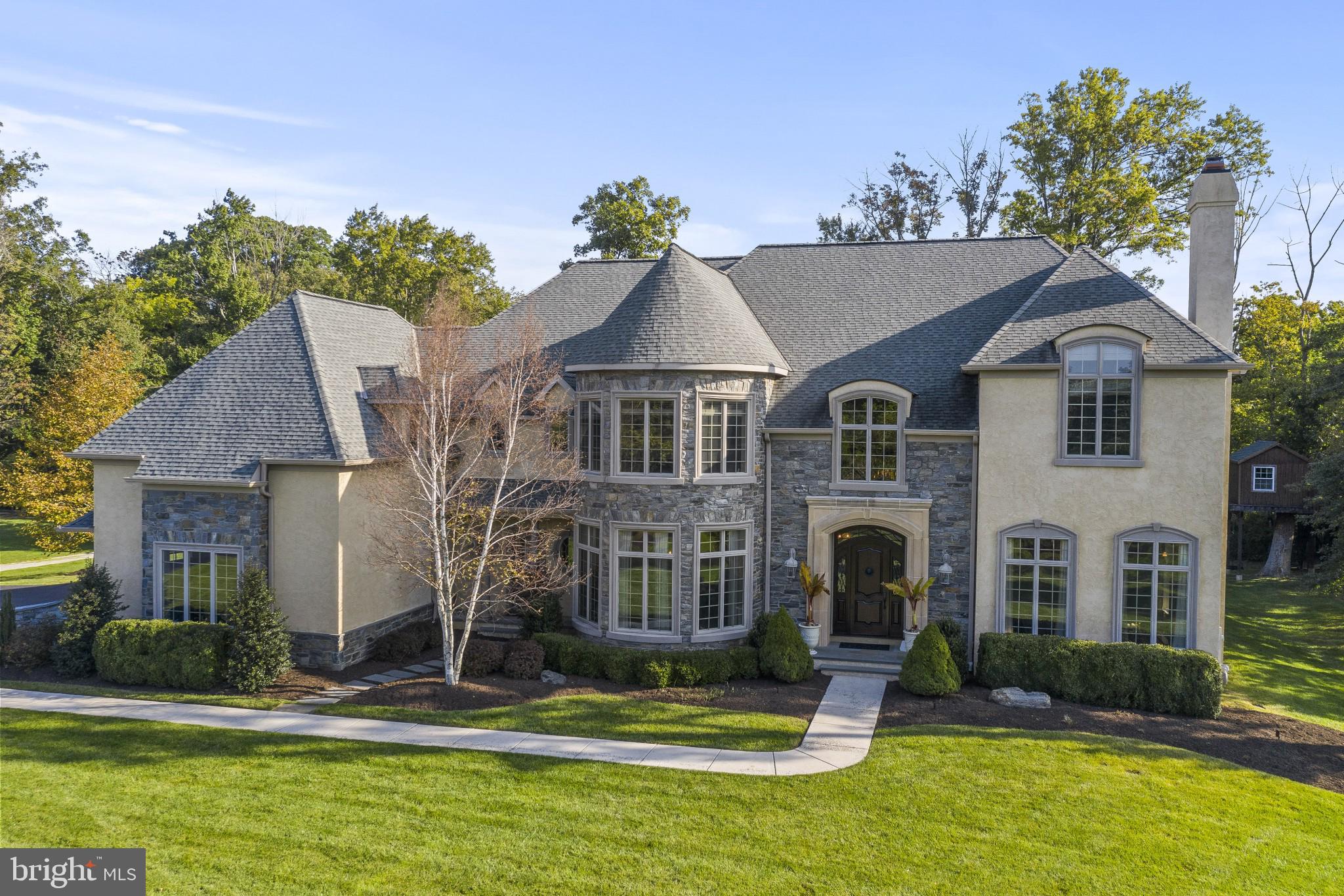 Welcome to 1120 Oakhurst in beautiful Lower Gwynedd Township. Exceptional craftsmanship and brilliant architectural details are found in this 7 Bedroom 6 Full and 2 Half Bath Custom Manor Home built by highly acclaimed Guidi Homes. Over 7800 square feet, including the Finished Walk-out Lower Level. Located within the Enclave at Gwynedd, which consists of 3 Exclusive Manor Homes. A Custom Tree House adorns the back yard, adjacent to the walking trails that connects to neighborhoods thru-out Lower Gwynedd. Superior features and upgrades begin with the exterior stone wall and continue to the interior with vaulted ceilings, open floor plan, site-finished red oak hardwood floors, en-suite Bedrooms and Baths and stunning upgrades, creating luxury that defines this special home. A beautiful solid wood door opens to the 2-Story Center Entrance Hall complete with chandelier and dramatic, custom split staircase with hardwood treads, carpet runner and hand-carved spindles. A Formal Living Room features a gas fireplace with marble surround. A Formal Dining Room offers a rare oval tray ceiling and a wall of windows accenting a unique curved wall. The Butler?s Pantry is equipped with a porcelain sink and cork walls, and a very spacious wine room that connect the Dining Room to the fantastic Gourmet Kitchen with stone accent wall. This kitchen features granite counters including a center island with seating for 5, tiled backsplash, Wolf Commercial gas, 6-burner stove with grill, 42 inch cabinets, Thermador stainless double ovens, Subzero refrigerator and an extra-large walk-in pantry closet. A sliding French door leads to the back flagstone Patio. The gracious flow of the home continues as the Kitchen and Breakfast Room open to the Great Room with vaulted ceiling, wood-burning fireplace with gas log lighter and optional gas insert. A grand corner Office (one of 2), features crown molding and offers a French door opening to a 2nd Patio. The Laundry Room includes a utility sink with a door that provides access to a second covered front Porch. A back staircase connects to the front and leads to the 2nd floor Balcony overlooking the 1st floor. The Master Suite is simply sensational and includes a bedroom with vaulted ceiling, a dressing area with 2 professionally organized closets with windows, and a large stunning Full Bath with radiant heated floor, enormous, 2-way Spa Shower with 5 shower heads and frameless glass walls, whirlpool tub and 2 separate vanities with marble counters. All 4 additional Bedrooms on this floor have their own Full Baths. The spacious Walk-out Lower Level is accessed by an open stairway w/hardwood treads & carpet runner and offers unlimited opportunities for entertainment, including a Media Room w/wall-mounted TV with surround sound(included with the house), a French door opening to the exterior, plus an adjacent Bar with wood counter, sink, mini-fridge & ice-make as well as a connecting Game Room. The 6th Bedroom with egress window is located adjacent to Full Bath with shower, and a 2nd office with egress window could also be used as a 7th bedroom. Finally, to complete the lower level, a Gym plus a utility room provide even more storage space (workbench included). Outside this magnificent home continues to dazzle. Electric 2-zoned dog fence, gas connection for a grill, and a very special Tree House, equipped with Anderson windows & solar light for those warm summer sleepovers! The oversized 3-Car Garage, with bump out, even includes a built-in, tiled dog shower! There are 4 zones of HVAC, an irrigation system with rain sensors, and a security system. ALL of this and located within award-winning Wissahickon School District, w/easy access to major routes, excellent restaurants and shopping Come and tour this breathtaking home with over $2.2 million in updates and make it yours TODAY!