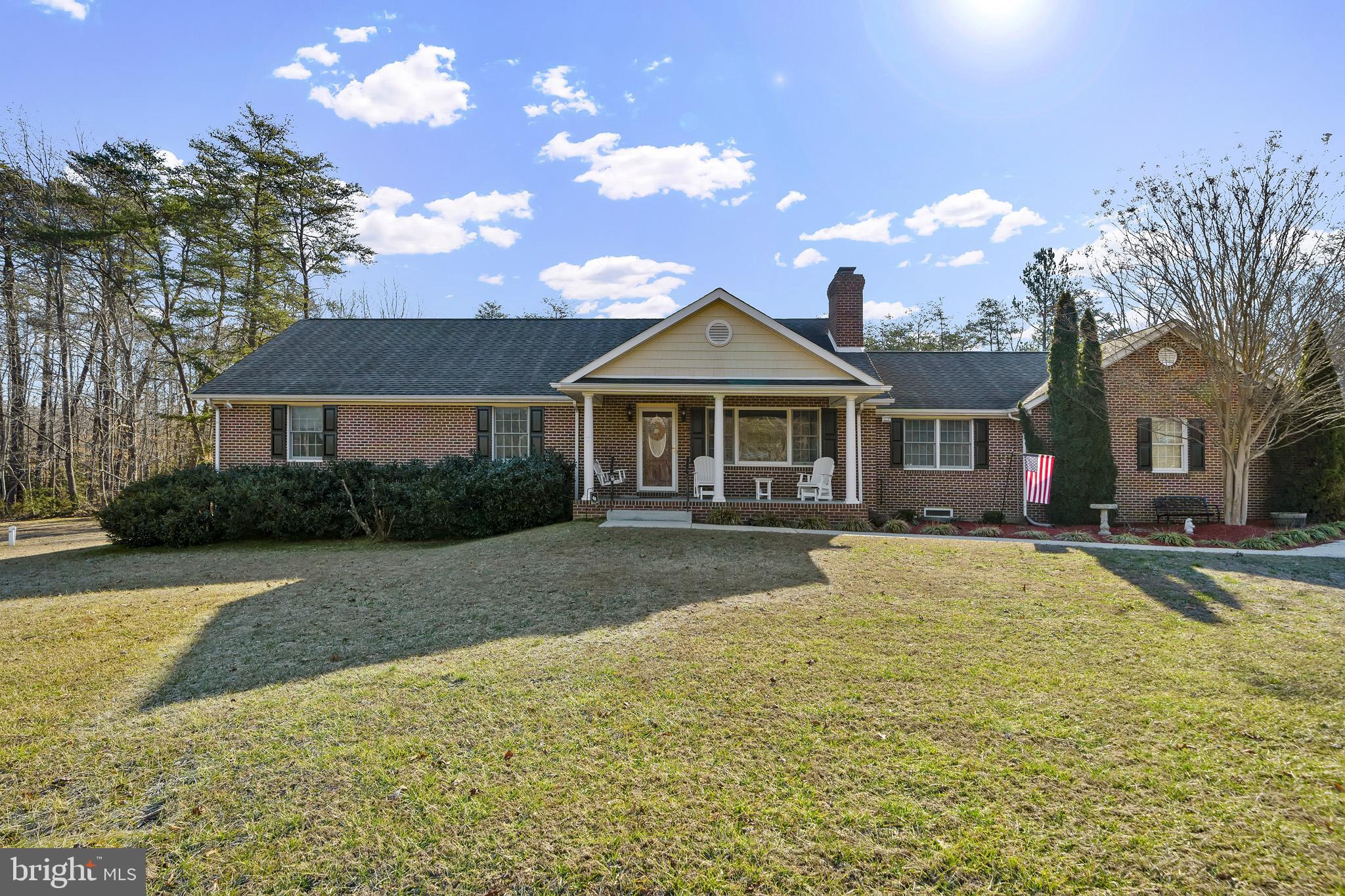 Welcome home to this all brick rambler on 3 acres with fully finished basement in sought after La Plata school zone!!! Make your way up to the front door while soaking in the desirable curb appeal with the well-manicured level lawn w/ extensive landscaping, expanded driveway w/ 2-car garage, charming front porch, and private yard backing to woods. Main level features 3 bedrooms, 3 full bathrooms, living room with gas fireplace, spacious laundry room w/ storage & wash sink, full bath off laundry room, office/mudroom off garage, & country kitchen with breakfast area. Kitchen boasts 42" cabinets, silestone quartz countertops, stainless steel appliances, backsplash, and doors of kitchen leading to spacious composite deck overlooking fenced in HUGE & LEVEL private backyard with shed. Lower level of this home boasts fully finished basement with family room/rec room, wood-burning stove... perfect for cozy evenings, full bathroom, wet-bar w/ fridge, and 3 additional nicely sized rooms w/ closets but no egress windows. Additional features include approximately 6-month old heat pump, updated kitchen, endless hot water tank, heat pump with oil back up, and concrete walkway wrapping around backyard. Run don't walk!!! This home wont last long!!!!