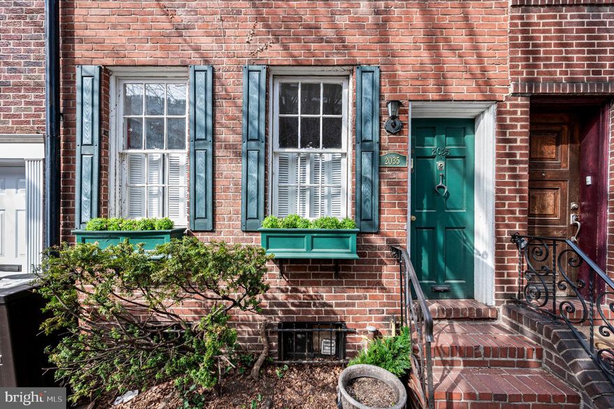 Come see this charming three-bedroom, two-bath, classic townhouse on a picturesque historic block in Rittenhouse Square. Tucked away on a tree-lined street, this house features hardwood floors throughout, fireplaces on every level, southern light, and a lovely oversized garden, perfect for morning coffee or quiet afternoon reading.
The first floor offers an open living and dining area anchored by a fireplace, creating a warm and inviting setting for everyday living and entertaining. Just beyond, the updated kitchen features a bay window overlooking the beautifully bricked garden.
The second floor includes two bedrooms and a hall bath with classic retro tile. The front bedroom enjoys southern exposure and a cozy fireplace, while the rear bedroom overlooks the garden and features a spacious walk-in cedar closet.
The third floor is a loft-style en-suite with vaulted ceilings, a fireplace, and both southern and northern exposures, offering flexibility as a primary suite, guest space, or work-from-home retreat.
A special property in the heart of Rittenhouse Square with appealing shops (coffee, bakery, restaurants) around one corner and a Michelin-starred eatery at the other corner.  All this with easy access to 30th Street Station as well as Penn, CHOP and Drexel.