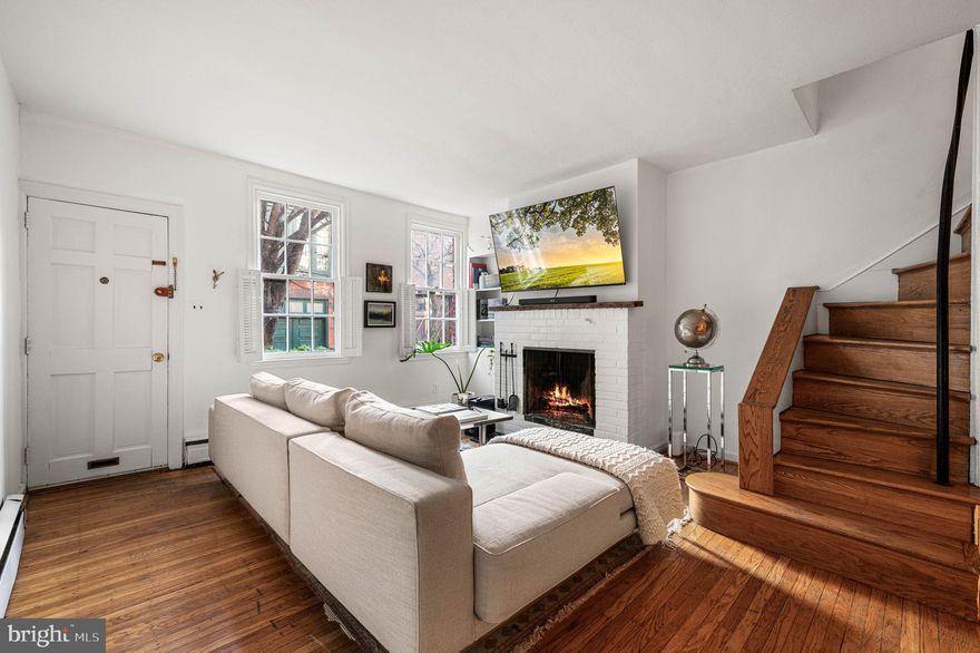 Come see this charming three-bedroom, two-bath, classic townhouse on a picturesque historic block in Rittenhouse Square. Tucked away on a tree-lined street, this house features hardwood floors throughout, fireplaces on every level, southern light, and a lovely oversized garden, perfect for morning coffee or quiet afternoon reading.
The first floor offers an open living and dining area anchored by a fireplace, creating a warm and inviting setting for everyday living and entertaining. Just beyond, the updated kitchen features a bay window overlooking the beautifully bricked garden.
The second floor includes two bedrooms and a hall bath with classic retro tile. The front bedroom enjoys southern exposure and a cozy fireplace, while the rear bedroom overlooks the garden and features a spacious walk-in cedar closet.
The third floor is a loft-style en-suite with vaulted ceilings, a fireplace, and both southern and northern exposures, offering flexibility as a primary suite, guest space, or work-from-home retreat.
A special property in the heart of Rittenhouse Square with appealing shops (coffee, bakery, restaurants) around one corner and a Michelin-starred eatery at the other corner.  All this with easy access to 30th Street Station as well as Penn, CHOP and Drexel.