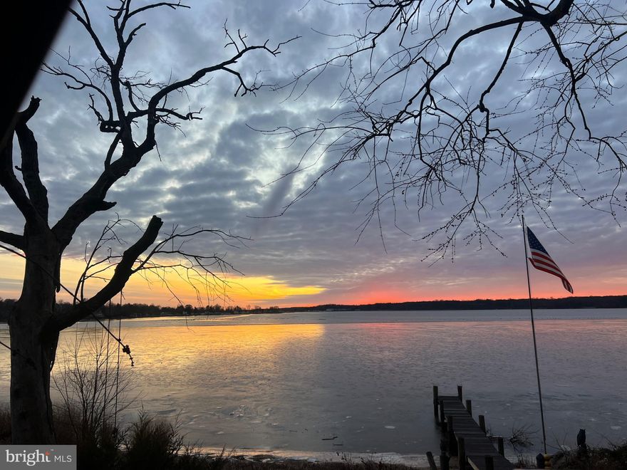 Amazing water views! Enjoy year-round vacation living with stunning Elk River vistas from your living room and both decks. This 2-bedroom, 1.5-bath home is move-in ready with brand-new flooring, fresh paint, and updated lighting throughout. The private pier is perfect for launching kayaks or canoes, or simply relaxing with a fishing line in the water. Nestled within a private community, this property requires a scheduled appointment for all showings—no drive-bys, please. Cash-only sale due to land lease.