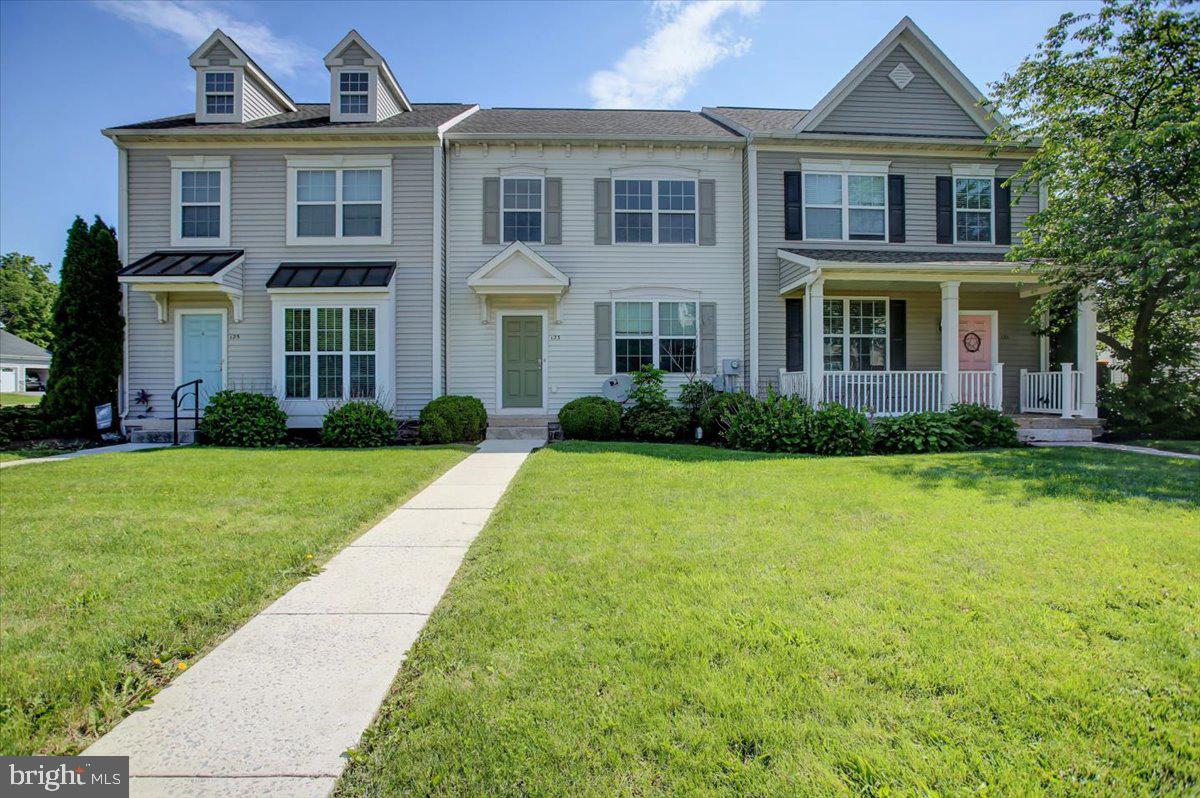 Welcome to your new home in beautiful Deerfield Commons! This stunning attached interior row house offers an open, convenient layout with a seamless flow between the kitchen and living room, perfect for any family. This house has a separate dining area which would be ideal for family meals or hosting dinner parties. Upstairs you will find three cozy bedrooms including a luxurious primary bedroom with a private en-suite bath for your ultimate comfort. There is an additional hallway full bathroom and downstairs half bath. The partially finished basement offers a fourth bedroom and another finished living space with endless possibilities. A serene outdoor space can be found in your backyard for unwinding in the evenings. A detached garage provides secure parking and extra storage. Make this elegant Deerfield Commons row house your new home and experience the convenience of modern living in a picturesque setting!