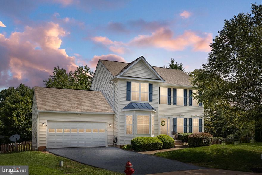 Move-In Ready!  This beautifully appointed Colonial, located in a welcoming cul-de-sac, offers 4 bedrooms/2.5 recently updated bathrooms.  The main level boasts hardwood floors throughout which carries through to the second level. Glass french doors off the foyer leads you to a private multi-purpose space to be used for office/study, living room, playroom, etc.   The newly renovated eat-in kitchen offers extended cabinetry and counter space, while featuring granite countertops, tile backsplash, stainless steel appliances, pantry and so much more!  Off the eat-in kitchen you will find a generous sized family room that showcases a gas fireplace!  The master bedroom features a cathedral ceiling, walk in closet plus an additional closet and an updated master bathroom.  The master bathroom features a new double vanity, shower with glass door, a separate soaking tub, tile flooring, updated lighting and mirrors!  Throughout the home you will find upgraded designer lighting and finishes!  The backyard, which is off the kitchen and family room, backs to trees and is a wonderful extension of the home with its fenced in yard and concrete patio for seasonal entertaining!   Move in ready and in an amenity filled community, this home is a delight.  Truly a Must See...Don't miss out!