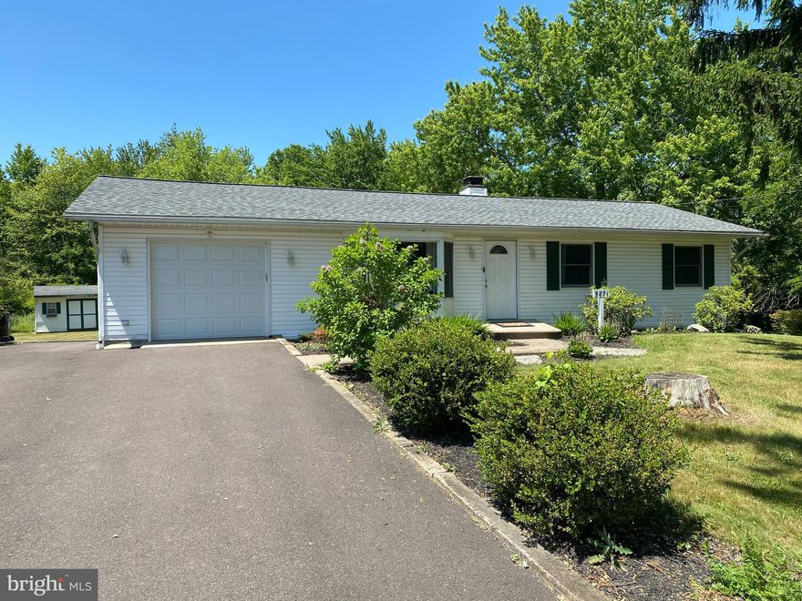 Single rancher with 4 bedrooms and 2 full baths on large lot in Central Bucks School District! Gleaming hardwood floors as well as newer vinyl flooring; super clean; views of horse farm across the street; step down to rear section of home which features  a large primary bedroom suite with full bath as well as laundry and storage area; front section of the home features living room dining room, galley style kitchen and 3 bedrooms and full bath; attached one car garage; the rear storage sheds are NOT included and are in disrepair and cannot be accessed by tenant;  a dog will be considered on a case-by-case basis