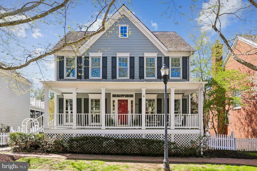 This beautifully renovated Kentlands home offers a flowing floorplan, light-filled living spaces, and lovely outdoor areas. The wide front porch creates a welcoming first impression, and opens onto a main level with special features in every room. The entry foyer adjoins a large living room with elegant moldings and transoms. The spacious formal dining room connects to a convenient butler’s pantry with additional cabinetry and a custom tile backsplash. The renovated kitchen is a show-stopper, complete with granite countertops, Craft-Maid cabinetry, glass-front display cabinets, pendant lighting, stainless steel appliances, a planning area, custom cabinets with rollouts and soft-close, and a roomy pantry. One of this home’s most special features, the versatile sunroom, offers abundant natural light and peaceful backyard views. Set off of the kitchen, the family room boasts a masonry wood-burning fireplace, recessed lighting, built-ins, and a wall of windows overlooking the backyard. A main-level laundry room with utility sink, a mudroom with a coat closet, and an updated powder room complete this level. 

Upstairs, new carpet and neutral paint create a fresh feel throughout. The spacious primary suite has a double-door entry, large windows, and a generous walk-in closet. The custom-renovated primary bath features a glass-enclosed shower, a soaking tub, double-sink vanity, linen closet, and decorator lighting and fixtures. Bedroom two has its own walk-in closet and bedrooms three and four are large and bright and feature roomy closets. The updated hall bath includes a double-sink vanity and a tub/shower with glass door and custom tile. 

The finished walk-out lower level provides exceptionally versatile living spaces including a spacious recreation and game room with recessed lighting and access to the patio, a library area and a full bath with decorator tile, lighting, and fixtyres. This level also offers multiple storage spaces. 

Outside, the backyard boasts a brick patio and a grassy lawn bordered by perennial gardens plus access to the detached two-car garage. Set on one of Kentlands’ most sought-after streets, this home offers close proximity to neighborhood lakes and walking paths, Rachel Carson Elementary School, and the countless dining, shopping, and entertainment options this community has to offer as well as to I270, the ICC, and the Metro.