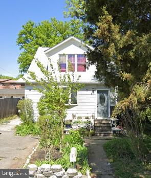 Spacious DUPLEX in Gwynn Oak, MD. This fixer-upper features 2 bedrooms, 1 full bath and an In-Law Suite which includes 1 bedroom and 1 full bathroom on the main level. 2 bedrooms and 1 full bath in the second unit which can provide rental income. The driveway can easily fit 4 cars. There's a deck on the side of the house that leads to a really nice sized backyard. Given a little TLC, this home can be turned into a beautiful residence and a profitable rental. Property being sold AS-IS