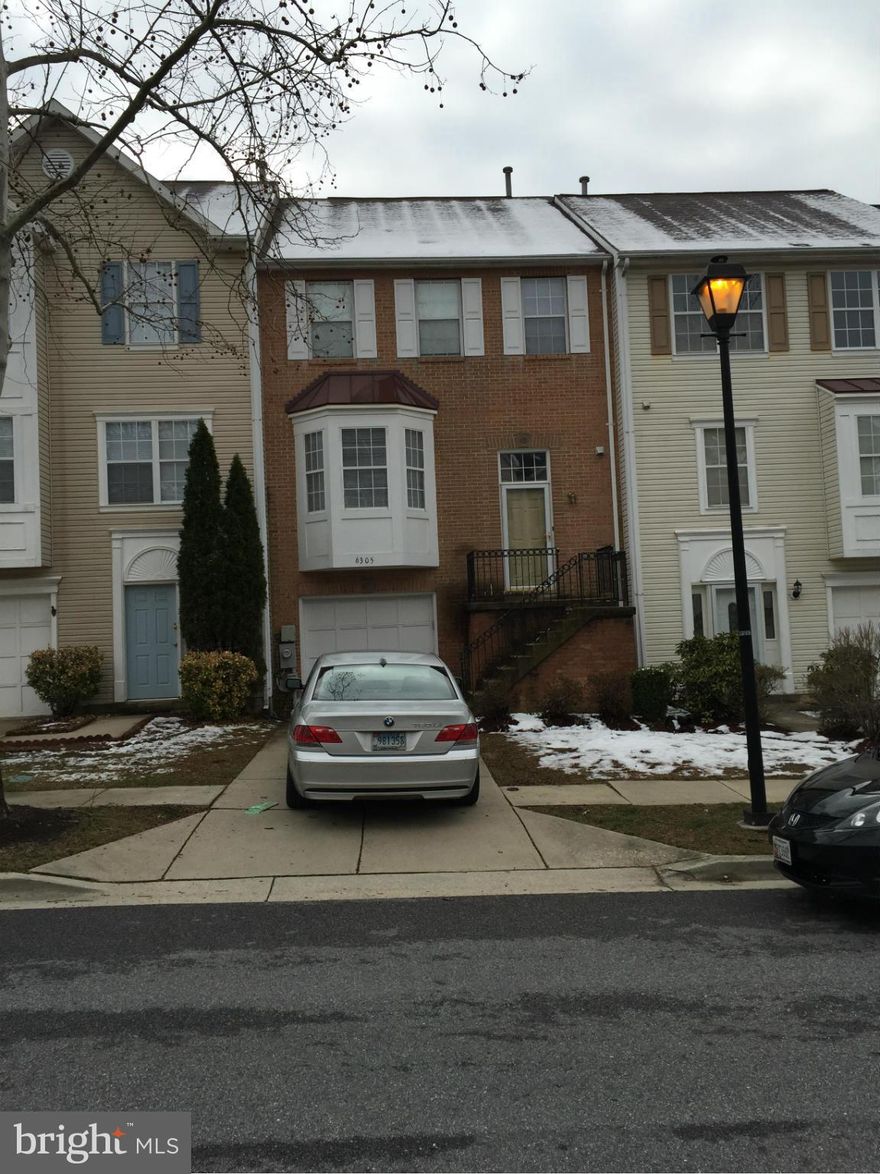 Move in Ready - Brick front townhome has ample space, hardwood floors, separate dining room, spacious living room with fireplace and large deck, spacious owners suite with walk in closet and bath, garage and a fully finished basement with rec room.  Great property!!