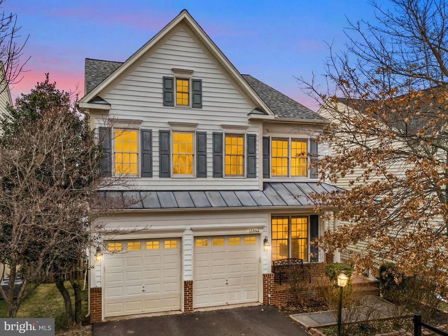 **Open House on Sunday, March 15th from 2:30-4:30pm**

Welcome Home to 13042 Taverner Loop!

This beautifully maintained and thoughtfully updated 5-bedroom, 3.5-bath residence offers approximately 4,442 finished square feet of elegant, functional living space designed for both everyday comfort and effortless entertaining. Over $100k+ value worth of home updates and upgrades throughout!!!

A grand two-story foyer welcomes you inside, where gleaming hardwood floors and a sweeping staircase immediately set a refined tone. The formal dining room, adorned with crown molding and classic judges paneling, sits gracefully across from the formal living room — creating the perfect setting for gatherings, celebrations, or quiet evenings at home.

At the heart of the home, the updated chef’s kitchen blends style and practicality. Refinished solid wood cabinetry with updated hardware adds a clean, modern touch and the updated kitchen features brand new countertops, a gas cooktop, wall oven, refreshed finishes, and an expansive island with generous prep space. It opens seamlessly into the inviting family room with fireplace — a warm and connected space ideal for hosting or relaxing.

Recent upgrades add both beauty and value across the home, including a stunning renovation of the master bathroom, a fully updated upstairs hall bath, elegant new chandeliers and light fixtures, new basement flooring, and a refreshed deck with brand new boards and fresh paint — creating a move-in ready experience throughout.

Upstairs, a loft-style sitting area connects four spacious bedrooms. The expansive primary suite serves as a private retreat, complete with its own sitting area, dual vanities, a soaking tub, and separate shower — thoughtfully designed and updated for comfort and privacy.

The fully finished, garden-level basement offers exceptional versatility with bright windows, French doors to the backyard, a fifth bedroom, and a full bath. A custom wet bar with cabinetry provides the opportunity to easily convert the space into a full in-law suite or private apartment setup.

Step outside to a beautifully terraced backyard garden designed for relaxation and entertaining, while the spacious deck invites you to gather with family and friends.

Additional highlights include a two-car garage with extra driveway parking, a roof just three years old, and HVAC systems replaced within the last six years. All of this with convenient access to Washington, D.C., shopping, dining, close proximity to Potomac Mills mall, as well as scenic local parks.

This will be one of the premier homes available for sale in the entire neighborhood! Schedule your private showing today — this is one you don’t want to miss.