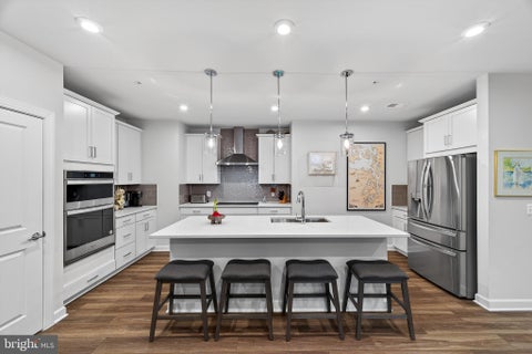 Photo of 21630 Hawksbill High Circle #204, STERLING, VA 20164 (MLS # VALO2131084)