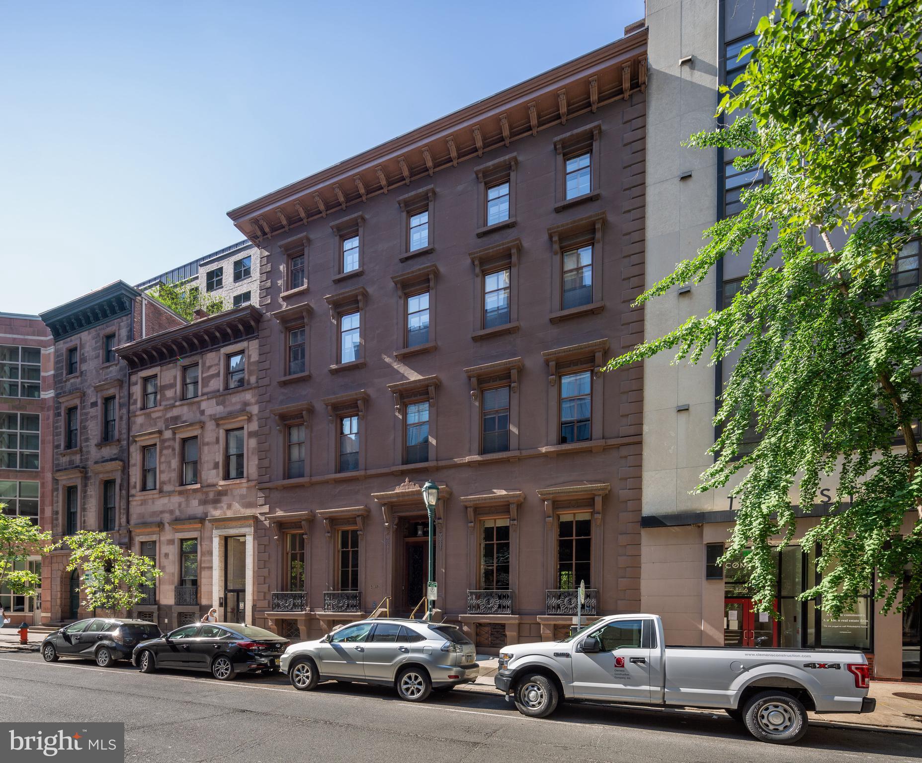 Welcome to 1622 Locust Street, a spectacular and prestigious double wide estate with an expansive rear courtyard situated one block form Rittenhouse Square on a charming, tree-lined block. Constructed in 1852 as the Isaac Lea House, an elegant and stately private residence, the property has been used for commercial purposes for the last century, and for the last five decades has been owned and occupied by the same family as legal offices. With the flexibility to be occupied commercially or through a residential conversion -- including the potential for by-right development of the courtyard -- the opportunity for investors, developers and commercial users alike to acquire this type of property truly only presents itself once in a lifetime! The building was designed by noted architect John Notman, who also designed the Athenaeum on Washington Square, as well as Saint Mark's Church directly across Locust Street. It is one of the first examples in the United States of the Italianate villa style, a distinction which earned the property a Historic designation in Philadelphia in 1967. The building boasts unparalleled original period detail beginning with the ground floor: an ornate vestibule, rooms with gracious proportions; high ceilings, full height windows and doors; crown molding, chair rail, wainscoting; arched and corbelled openings; marble fireplace mantels and inlay parquet floors. A grand central staircase with ornate, carved wood balustrades connects the building’s four stories, capped with a stained glass oval skylight. In the rear of the property, accessible from a covered porch sits a large and pristine courtyard, lined with wrought iron railings and brick walls, paved with bluestone. Mature trees, manicured garden and a fountain create the feeling of a secluded urban oasis. The patio backs onto Latimer Street, providing additional light and air. Each floor of 1622 Locust overlooks beautiful and serene views to the north and south. A covered driveway for two cars is accessible from both the building and Latimer Street.