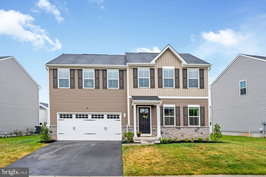 Magnificent home located in the Meade’s Crossing Community in Taneytown with 2 car garage and classic modern amenities and design throughout! Sellers have recently updated the home with brand new waterproof luxury plank flooring throughout the the main level that features shiplap walls, bright and spacious living room with an electric fireplace finished in roman clay open to the gourmet kitchen with center island and breakfast bar with concrete countertops, tile backsplash, new large sink and faucet, adjacent dining area, a room for an office or den, and half bath. Upstairs the Primary’s Suite features a large walk-in closet and an ensuite bath with double vanity and large rainfall and handheld shower heads. There are 3 more bedrooms, 2 with walk-in closets, a full bathroom, and conveniently located laundry room. The fully finished lower level family room is great for movie night and has a separate room you can use for recreation or exercise. Walk outside the kitchen this summer to barbecue on the patio in the large partialy fenced in yard where you can enjoy time with family and friends this summer. This serene and beautifully landscaped community includes an outdoor pool, fitness center, clubhouse, walking paths, playgrounds, dog park, and a community garden. Located close to shopping, dining, Rte. 140, and a 10 minute drive to Westminster. Schedule your tour today!