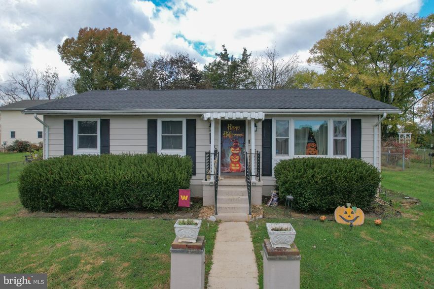 ***THIS PROPERTY IS ELIGIBLE FOR A  $10,000 GRANT***
Welcome home to this 3-bedroom, 1-bath charmer in the heart of Ranson, WV—where small-town living meets everyday convenience. With 1,020 square feet of thoughtfully designed space, this home offers both comfort and function.

Step inside to a light-filled living room featuring a beautiful bay window and cozy fireplace—the perfect retreat to unwind at the end of the day. The eat-in kitchen includes newer appliances, a brand-new dishwasher, and stackable laundry for convenience. A picture window over the sink overlooks the fenced backyard, ideal for pets or peaceful mornings with coffee in hand.

Step out the back door onto a spacious deck that’s perfect for grilling, entertaining, or simply enjoying the private wooded view that backs to open farmland. You’ll forget you’re in the city!

All three bedrooms feature ample closet space and natural light, while the updated full bath shines with a new tub, flooring, and sink—bright, fresh, and ready for move-in.

Nestled in sought-after Jefferson County, this property combines tranquil living with prime location—just minutes from major commuting routes to Northern Virginia and the DC Metro area, shopping, dining, and local parks.

Whether you’re a first-time buyer, downsizer, or investor, this petite but perfectly laid-out home checks all the boxes.