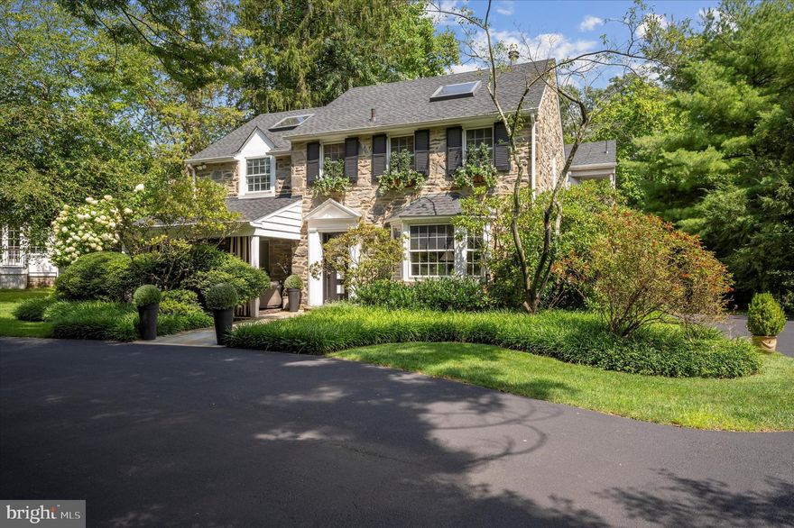 Introducing 909 Centennial Road, a captivating stone colonial home nestled in the highly sought-after neighborhood of Penn Valley within the award-winning Lower Merion Township. This remarkable property exudes timeless elegance and boasts a wealth of luxurious features.

As you approach this home you immediately see the inviting and charming Front Porch.  You enter the home through the striking black and white architectural front door and you are greeted by the grandeur of rounded archways leading into a spacious dining room adorned with inlaid hardwood floors. The adjacent kitchen beckons with a breakfast room and a large island featuring a counter bar and creating the perfect setting for culinary delights and casual gatherings.
Co-listing agent is related to Seller


A few steps down you'll find a cozy family room adorned with a black marble fireplace and built-in floating shelves, all complemented by the allure of new Pella windows. The adjacent bar area, complete with a brass sink and mirrored shelves, offers a touch of sophistication while providing a seamless transition to the breathtaking view of the pool and expansive backyard.

The first floor also presents a powder room, a large coat closet, an office/den with elevator access, and a living room boasting a stone fireplace, brass and wood mantle, and large bay windows that bathe the space in natural light.

Ascending the open stairway with double brass railings to the second floor, you'll discover a thoughtfully designed layout that includes a series of beautifully appointed four bedrooms. The two very large bedroom both adorned with a skylight features a generously sized walk-in Jack and Jill closet, providing ample storage space and organizational convenience to meet your needs. The hall tiled bathroom, complete with a tub/shower and a window that infuses the space with natural light.The third bedroom, boasting a large closet and an elevator entrance, offers both comfort and practicality, making it a versatile space that can adapt to your specific needs. Conveniently located in the hallway is a laundry room and linen closet, featuring double bifold doors for easy access and discreet storage solutions, ensuring that daily chores are seamlessly integrated into your lifestyle. The master suite is a true sanctuary, featuring a platform bed, built-in nightstands and headboard, and an abundance of Pella windows offering panoramic views of the lush surroundings. The master bath is a luxurious retreat, adorned with marble detailing, a spacious jacuzzi with marble surround, a rejuvenating steam shower with a window and marble bench, and a super wide vanity with double sinks.

The lower level offers additional space for relaxation and entertainment, with a newly carpeted stairway leading to a versatile area that includes a cedar closet, an exercise room with an elevator entrance, a bedroom/playroom with a closet, a sauna, a full tile bath with a stall shower, and ample storage space.

The backyard is truly a haven for outdoor enjoyment and relaxation.The centerpiece of this outdoor oasis is the multi-level decks with an inviting pool, complete with a hot tub, offering the perfect setting for leisurely dips and unwinding.  Amidst the expansive grounds, you'll find ample space for recreation and fun, including a trampoline that promises hours of enjoyment for both children and the young at heart.  The backyard offers endless opportunities to create cherished memories with family and friends.

This exceptional property also features an elevator installed just a few years ago which goes from the basement to the second floor, adding convenience and accessibility to its list of impressive attributes. There is also a generator.

With its enchanting blend of sophisticated charm and modern amenities, 909 Centennial Road is a rare gem in an amazing neighborhood with eazy access to Center City or KOP. Open House Thursday Feb 22nd 4-6pm.