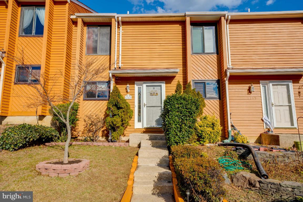 With three levels of living and on-trend finishes throughout, this beautiful home proves there is no need to compromise on style and comfort when it comes to easy-care living. Take your pick from the two bedrooms, serviced by 2.5 bathrooms for added comfort. Crown molding, recessed lighting and hardwood floors are on show in the open-plan living and dining room while the handcrafted kitchen features easy-care tiled floors. Granite countertops add a touch of luxury and there is also a suite of electric appliances and ample storage. On sunny days, the open-air deck is ready for you to rest and relax as you take in views over the gorgeous woodlands or you can retreat to the fully finished basement with a walkout to the backyard. An irrigation system keeps the lawn looking lush and there is plenty of space for some fun in the sun. Community playground and only steps away from the Broadneck Peninsula Trail and Broadneck Park. Your new home is conveniently located close to Route 50 that takes you to Washington, Baltimore, Maryland's Eastern Shore and beyond.