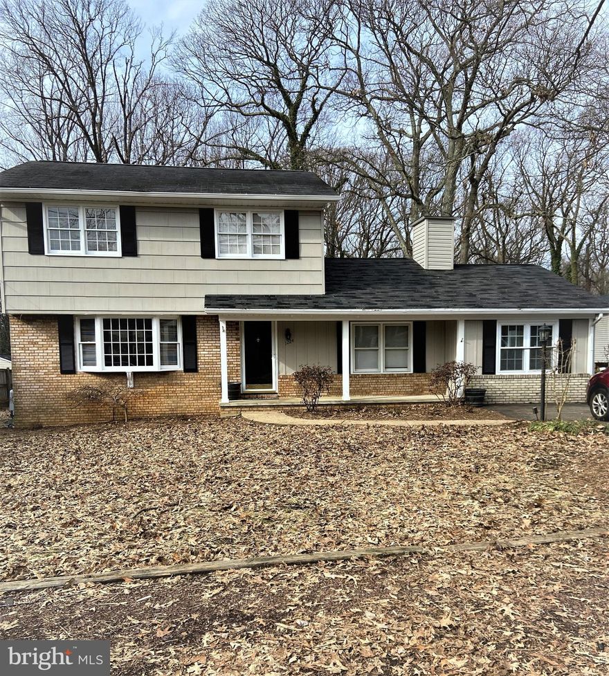 Great Opportunity to own in Water Privileged Community of Cape St Claire! Home has been beautifully remodeled and features updated Baths and a sparkling NEWLY DESIGNED KITCHEN.  Spacious Living Room off Eat In kitchen and Family Room with fireplace insert for those cozy winter nights. Home has new flooring throughout and has been freshly painted both inside and out.  Main Floor 4th Bedroom could also be used as in home office for those who work from home.  Enjoy outdoor living? Relax on covered back porch overlooking large deck, patio and scenic back yard. Community features beaches, boat ramp, fishing pier, community events, and playgrounds. Boat docks and community pool are in the neighborhood but are not included in the HOA amenities, require additional fees and are not guaranteed. Hurry! Don't wait! Schedule your appointment today!