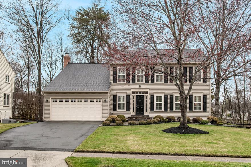 Beautiful colonial home in the highly desirable community of Virginia Run. This home has 4 bedrooms, 3.5 bathrooms, 3,708 square feet and is sited on a 0.31 acre lot. Open floor plan and an abundance of natural light. Features include crown molding, chair railing, and recess lighting. Main level features formal living and dining rooms with plenty of space for entertaining guests. Large kitchen with granite countertops, ample cabinet space, tiled backsplash, wall oven, island, butler’s pantry, and breakfast area. Family room with built-in s surrounding fireplace and easy access to screened-in deck. Upper level features owner's suite with 3 walk- in closets including a his and her closet, en suite bath with soaking tub, dual sinks, and tiled walk-in shower with frameless glass door. Three additional bedrooms and one full bathroom on the upper level. Finished walk-out basement with tons of potential with a large recreation room featuring a wet bar, built-in cabinets, recess lighting, built-in bookcases, full bath, storage and laundry room. Outdoors features fenced manicured yard, patio, and large screened-in deck for watching the wildlife in the trees. Close to Cub Run Stream Vally Park and Pleasant Park. Short drive to shops and restaurants. Nearby Westfield HS Pyramid.