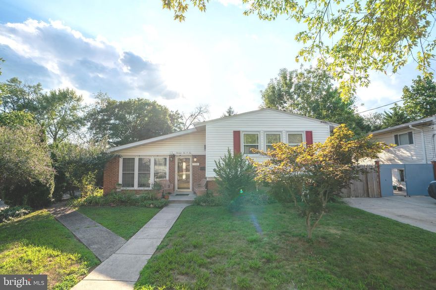 Welcome to the desirable Greenwood Knolls. This charming, spacious and well-maintained home features 4-Bedrooms and 2-Full bath with over 1,800 square feet. Kitchen was recently updated in 2024 with beautiful new cabinetry. It is conveniently located near the Glenmont Metro station, five minutes away from the Wheaton Mall and approximately 10 minutes from Downtown. Nestled in Silver Spring, this home features a lovely open fenced in backyard, providing a tranquil and serene oasis perfect for morning coffee and those summer BBQs with friends & family. The grand bay window allows vibrant natural lighting to fill the space. The home boasts hardwood floors throughout the main and upstairs levels, with vaulted ceilings in the main level. Its prime location makes it an ideal choice for those seeking convenience and comfort. Come and see this warm and welcoming home for yourself!