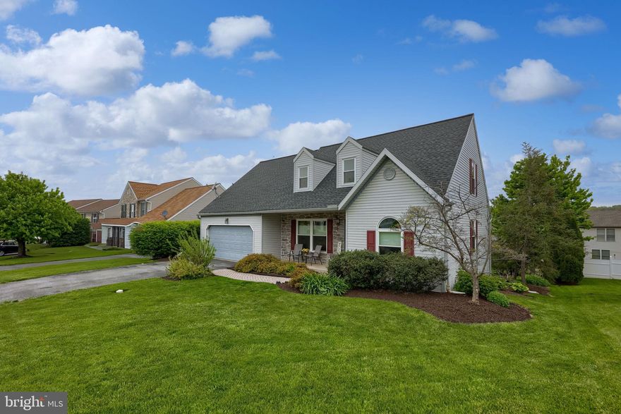 In the quaint Cedar Bluff neighborhood, this Cape Cod–style home offers ample storage, bright open living spaces, and a practical, well-designed layout. 

Upon entering the home, you’re welcomed into a two-story foyer and light-filled living and dining area. Carpeted flooring, crown molding, and large windows overlooking the backyard create a comfortable and inviting atmosphere. The open floor plan allows for easy entertaining and everyday living.  

The kitchen features Frigidaire appliances, Formica countertops, and numerous built-ins including pantry storage, an appliance garage, and a cookbook nook. Beyond the kitchen is additional storage with a coat closet and a laundry room with washer and dryer. This area also provides access to the two-car garage, which includes a pegboard wall for organizing outdoor and lawn equipment along with a designated work area. 

The oversized main-level primary bedroom offers large windows, a walk-in closet, and an attached bathroom with a soaking tub, stall shower, vanity, wall sconces, and built-in cabinetry. Outdoor living can be enjoyed by the attached deck overlooking the backyard and neighborhood—ideal for grilling, relaxing, or entertaining. 

Upstairs you’ll find two bedrooms and an additional bonus room. The first bedroom features hardwood flooring, vaulted ceilings, ceiling fan, and large closet space with built-in shelving. The second bedroom includes carpeting, a ceiling fan, front-facing window, and closet with shelving. Through this bedroom is an expansive bonus space ready to be finished or customized to suit a variety of needs. The upstairs bathroom includes a tub shower, vanity, and wall sconces. Additional updates include a newer roof, HVAC system, water heater, and windows. 

The carpeted full walkout daylight basement offers flexible space for exercise equipment, office use, or additional living space. Storage is abundant with a utility room, designated storage closet, and additional space beneath the stairs. Step outside to the paver patio and enjoy the open backyard complete with a firepit, garden beds, and wiring for a hot tub. 

The front yard overlooks the neighborhood and includes two driveway parking spaces along with additional street parking. The location provides convenient access to a nearby park and major routes including Route 30 & 283, as well as Columbia Avenue and Marietta Avenue.

Seller is offering a one year home warranty to the buyer of home.