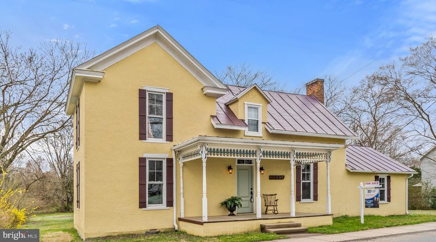 NEW PRICE!!!  Authentic Modern Farmhouse. The main house built 1850 / added on 1893 / new porch and renovation 2017! Historic home completely remodeled with all the charm and character of 19th century craftsmanship. Updated in 2017,  new electric, plumbing, HVAC, Nest thermostats, USB ports, LED lighting and original Heart Pine floors in most rooms. Main level primary bedroom with pine flooring, Living Room with wood burning fireplace! Quaint dining room with tile flooring off of living room. Step down from an original wood  threshold to the open kitchen with recessed lighting, stainless steel appliances, granite counters and exposed wall of stone from the original house!  The upper level features 2 private bedrooms with wood flooring that share a large updated bathroom.  Enjoy the charm and character of this modernized farmhouse while relaxing on the covered front porch!
