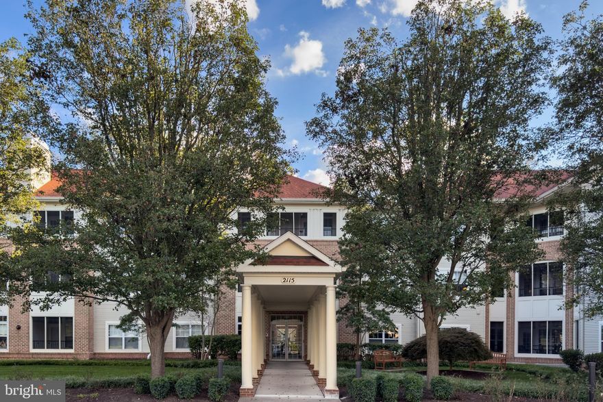 Great opportunity to lease a top-floor condo in the sought-after Waverly Woods community. Brand new LVP flooring was installed entire unit. This unit features two bedrooms, two full bathrooms, and a versatile den/office equipped with a built-in desk and cabinets, perfect for remote work or an additional living space. The primary bedroom offers a walk-in closet, a double-sink vanity, and a walk-in shower for your comfort and convenience.
The upgraded kitchen is a highlight, boasting elegant granite countertops, newer stainless steel appliances, and a bright breakfast area with large windows. The spacious living room seamlessly opens to a bright and airy screened-in porch, providing an ideal spot for relaxation.
Further enhancing this offering, the unit includes a secured storage room and one assigned covered parking space located in the lower garage, with direct elevator access into the building for ease. Its prime location offers exceptional convenience, being close to a variety of restaurants, shopping centers, electric car charging stations, and banks. Commuters will appreciate the easy access to major routes for both Baltimore and Washington D.C.