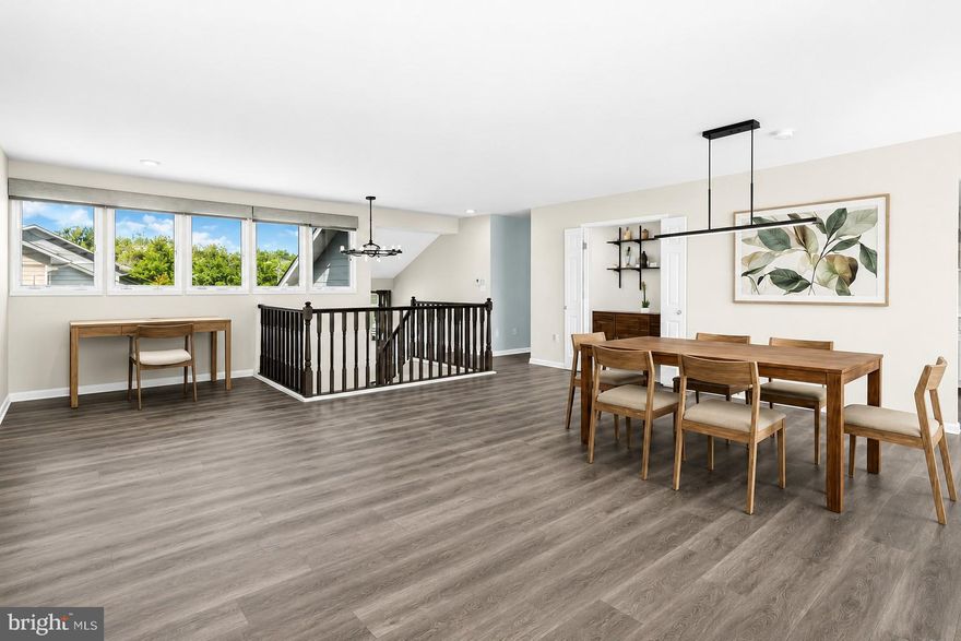 Escape to Swan Road Villa Townhomes — a bright, low-maintenance retreat. This reverse-living 2‑bedroom, 2.5‑bath townhome features an open floor plan on the second level with a galley kitchen, dining area, and a combined living room that opens to a balcony spanning the entire back of the second floor — perfect for indoor/outdoor living and filled with natural light. The main level includes two bedrooms, two full baths, and a laundry room. Convenient access to golfing(with membership), walking and biking paths, and a waterfront park. Ideal as a first home, second home, primary residence, or investment.  Recent upgrades - roof, bathrooms, flooring, HVAC unit, landscaping, and interior painting. *Some images are virtually staged*