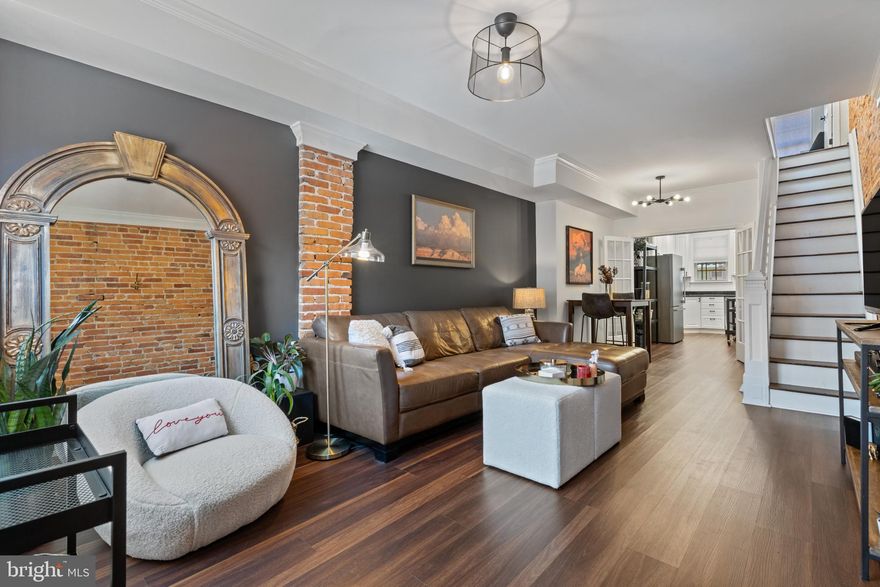 Welcome to 631 S. Decker Ave! This beautifully updated 2-bedroom, 1-bath rowhome in the heart of Canton is the perfect blend of modern upgrades and classic charm. As you step inside, you'll immediately be greeted by the spacious living room, featuring gorgeous hardwood floors and exposed brick that add character and warmth. The open dining area flows seamlessly into the kitchen through elegant French doors, creating an inviting space for entertaining. The kitchen itself boasts granite countertops, a new stainless steel refrigerator, dishwasher, gas stove, built-in microwave, custom pantry shelving, and a convenient moveable island—ideal for both cooking and casual meals. Step outside the kitchen to your private ONE-CAR PARKING PAD, offering much needed convenience in the city.  Upstairs, you’ll find two generously sized bedrooms and a newly updated full bathroom located centrally between the two rooms. Beautiful refinished hardwood flooring is on the upper level including the stairwell up.  The home's bright, natural light highlights every detail, making each space feel open and airy. The partially finished basement offers an additional living space - perfect for a bonus area or home office, along with plenty of room for storage. You’ll also find the laundry area and a “Baltimore toilet” for added convenience in the basement. All this, just one block from Patterson Park! This home has been lovingly maintained and thoughtfully updated to offer you the ideal living experience in a vibrant, central neighborhood. Schedule your private tour today!
OFFER DEADLINE: Tuesday 3/11 at 12pm.