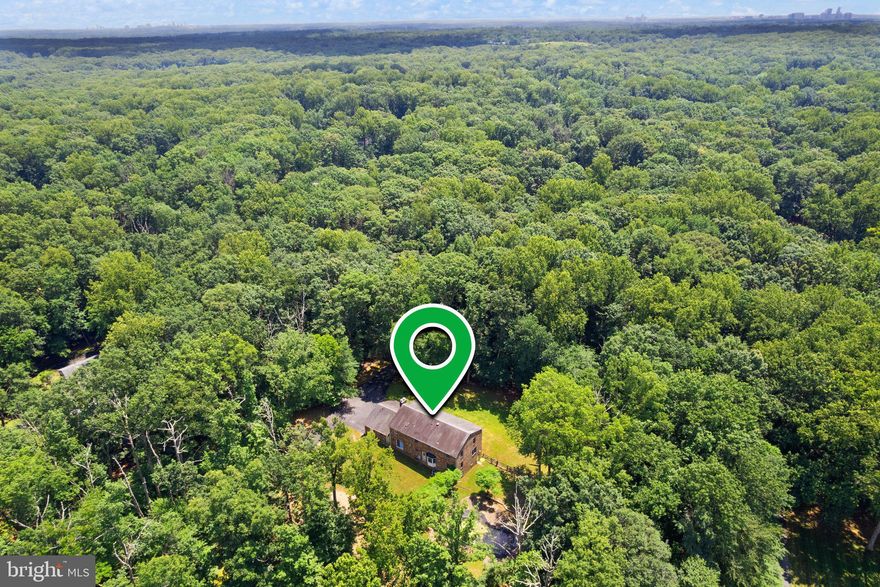 Welcome to 11112 Corobon Lane, a beautifully updated Colonial nestled on 5 picturesque acres in sought-after horse country. Located within the prestigious Langley High School pyramid, this exceptional property offers the perfect blend of privacy, charm, and convenience.

Whether you're an equestrian enthusiast or simply value the serenity of mature trees and open space, this home is a rare opportunity. The expansive lot features a detached 6 stall stable and in-ground pool (both sold *as-is*), offering incredible potential for outdoor living, hobbies, or equine use.

Inside, you'll find a spacious and light-filled layout .  The main level features hardwood floors through out, a large living room and dining room, renovated kitchen with attached breakfast room and a large family room with brick front hearth.  The main level also features a private office with french doors and large mud room with main level laundry.  

Upstairs you will find hardwood floors, 4 guest bedrooms, 2 guest baths and a spacious primary suite with huge walk in closet and renovated primary bath with walk in shower.  

The lower level offers a convenient walk out to the side yard, a full bathroom a brick front hearth and wood burning fireplace and the chance to finish the build out with your own vision

Don’t miss your chance to experience the lifestyle that only Great Falls can offer—peaceful, private, and still just minutes to top schools, shops, and major commuting routes.