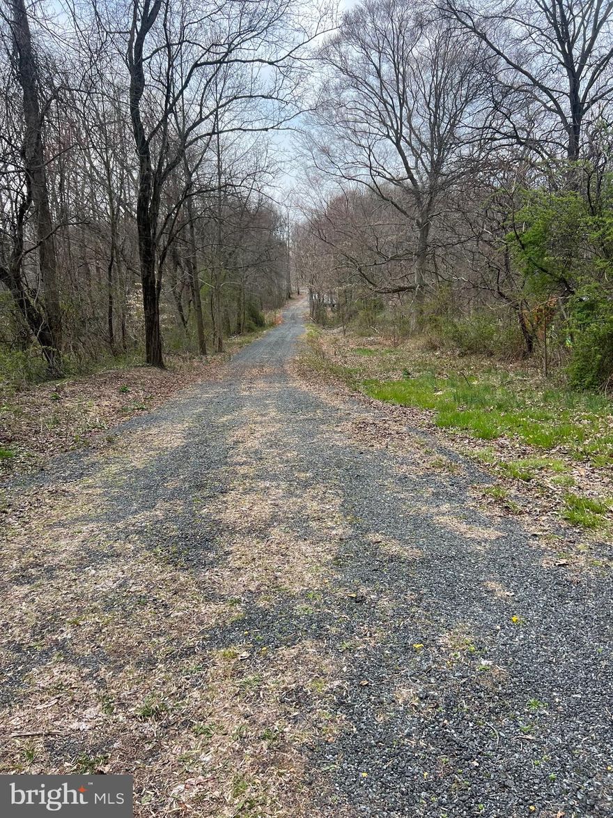 Welcome to this beautiful wooded 6.1 acre lot at the end of a wooded court in Rising Sun, MD.  This lot has already been perced, has a cleared building lot and driveway.  This would be the perfect place to build and raise a family with tons of nature and room for trails, 4 wheeling, hunting etc.  There is a small stream on the property as well.  This lot is furthest from the main road but there is an option of buying all three lots and owning and renaming the entire court.  (Double wide at beginning of court will be removed unless the buyer wants to purchase it).  This property is currently on a forest retention program which the new buyer has the opportunity of continuing, which makes the taxes on this property ONLY $12 a year.