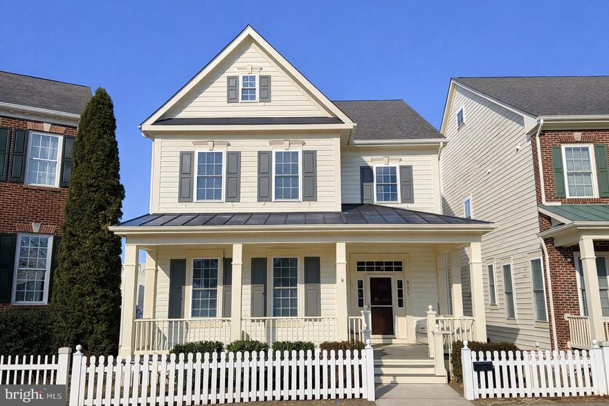 Ideally located within the Lakelands, this four-bedroom home offers extensive interior updates, spacious living areas, and access to community amenities right outside your front door. Brazilian hardwood floors extend throughout the main level, beginning in the entry foyer and continuing into the large living and dining rooms. The living room features recessed lighting, crown molding, and updated fixtures, while the dining room includes crown and chair rail moldings and an updated chandelier. The well-appointed kitchen includes granite countertops, a tiered breakfast bar, granite-topped center island, updated appliances, white cabinetry, tile backsplash, recessed lighting, and pantry storage. The adjacent breakfast area opens to the family room, where a gas fireplace with marble surround anchors the space. A powder room with pedestal sink, along with a mudroom and laundry room offering additional shelving, utility sink, coat closets, and direct access to the rear patio, complete the main level. Hardwood flooring continues up the staircase and into the upper hallway. Highlights of this level include the primary suite, featuring a double-door entry, triple window, ceiling fan, and new carpet. The en-suite bath boasts a soaking tub, glass-enclosed shower, double-sink vanity, and separate WC. The three additional bedrooms are large and bright, and include lighted ceiling fans and roomy closets. The second full bath has a tub/shower. A linen closet and pull-down attic access provide added storage. The finished walk-up lower level features a versatile recreation room with recessed lighting, a big bonus room, a full bath, an insulated storage room, a wall of closets, under-stair storage, and utility room. The outdoor offers more space in which to relax and entertain. including the welcoming front porch and rear patio. The two-car garage affords more convenience and space for storage. Other special features include updates to all major systems plus the main house roof, replaced in 2025. This gorgeous home offers easy access to the countless shopping, dining, and entertainment options this world-renowned community offers as well as to major commuter routes - and you'll feel like your own private pool is right outside your front door!