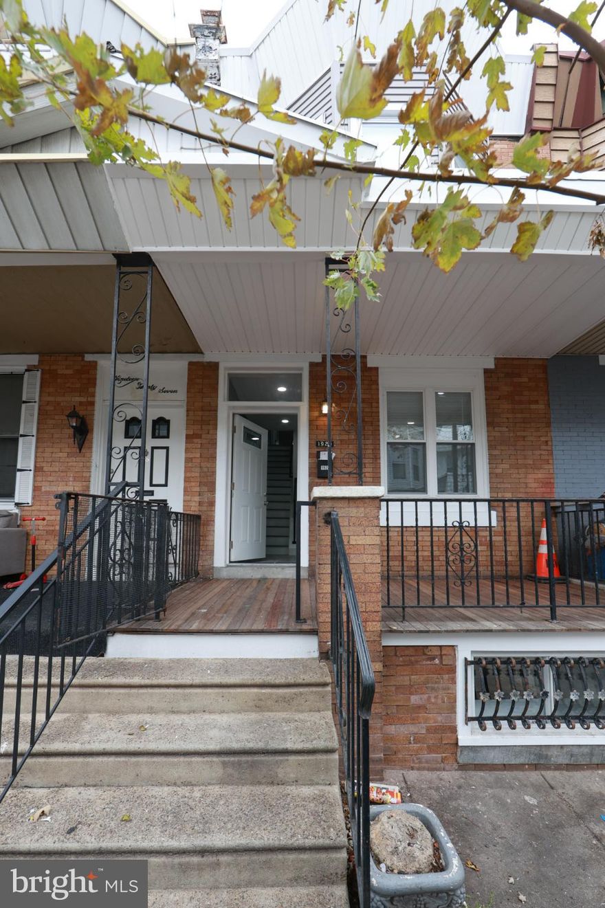 Welcome to this newly renovated three bedroom, two bath home in the Harrowgate section of the city. The main level offers a bright open living area that flows seamlessly into a modern kitchen outfitted with white shaker cabinetry, quartz countertops, and stainless steel appliances. Just off the kitchen is a bonus room with laundry hookups that also provides convenient access to the backyard.
The upper level features three well sized bedrooms with high ceilings, recessed lighting, and contemporary ceiling fans, along with a stylish full bathroom. The lower level adds even more versatility with a second full bathroom and additional space that can serve as storage, a home gym, an office, or any setup that suits your needs. Major improvements include all new plumbing, new windows, a new roof with gutters, new exterior siding, and a complete electrical upgrade. Seller is in the final stages of completing renovations, with a few appliances still being installed, including mini split systems to ensure year-round comfort.
With fresh finishes, modern upgrades, and thoughtful improvements throughout, this move in ready home offers value and peace of mind for years to come. Conveniently located near I-95 and just a short walk to the train station, the property allows for quick and easy access to Center City. Don’t miss the chance to make this beautifully renovated home your own. **Also a great opportunity for first-time homebuyers: this property qualifies for a $10,000 grant through certain lenders which can be combined with the Philly First Grant as well! **