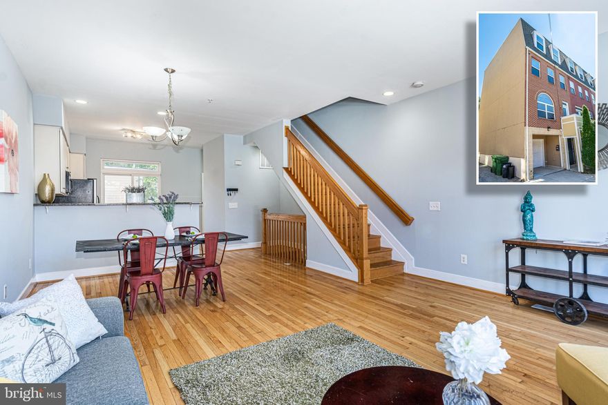 INCREDIBLE VALUE FOR THIS END OF GROUP GARAGE TOWNHOME WITH OVER 2,600 SQ. FT. AND ROOFTOP TERRACE!  Features include an open floor plan with hardwood floors throughout the main level, spacious living room and dining area, Chef's kitchen with granite counters & ss appliances, main level half bath, 3rd level with 2 bedrooms and 1 full bath, 4th level with additional 2 bedrooms and 1 full bath, a rooftop terrace with commanding views, and a 2 car garage!  Located close to Johns Hopkins, Fells Point, and Harbor East.