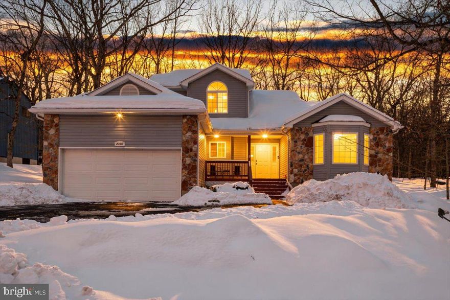 Turn-key, STR-friendly retreat in the heart of Saw Creek Estates -- just a few blocks from the closest gate! This beautifully loved and meticulously maintained 3-bedroom, 3-bath home is the perfect vacation escape, investment property, or full-time residence. Located in a short-term rental-friendly township and offering access to Saw Creek's five-star amenities, this home truly stands out. The current owners purchased the home with plans to make it their forever retreat and invested heavily in quality upgrades completed by licensed and insured professionals. While plans have since changed, their commitment to craftsmanship and long-term ownership is evident throughout. Step inside to a sun-filled living room with soaring cathedral ceilings, enhanced by two brand-new skylights and a cozy brand-new propane fireplace. Refinished original hardwood floors add warmth and character, while the first-floor primary suite offers ease and comfort. Upstairs, a striking catwalk overlooks the living space and leads to two well-separated bedrooms and a full bathroom, ideal for guests' added privacy. The home comes fully furnished, including brand-new TVs, making it completely move-in or STR-ready from day one. Major upgrades include a brand-new roof, gutters, and a new furnace, all with transferable warranties to the new owner, delivering true peace of mind. Outside, enjoy something incredibly rare for Saw Creek: a flat yard AND flat driveway, two-car garage, no neighbors behind. Perfect for relaxing or entertaining. Gazebo included, Whether you're looking for a high-performing short-term rental, a weekend getaway, or a forever home in the Poconos, this one checks every box. Saw Creek Estates amenities include: -Indoor & outdoor pools -Ski slope & tubing hill -Fitness center -Tennis, basketball & pickleball courts -Playgrounds, beach & lake access -Restaurant & bar -24/7 gated security ---This is Saw Creek living at its finest---