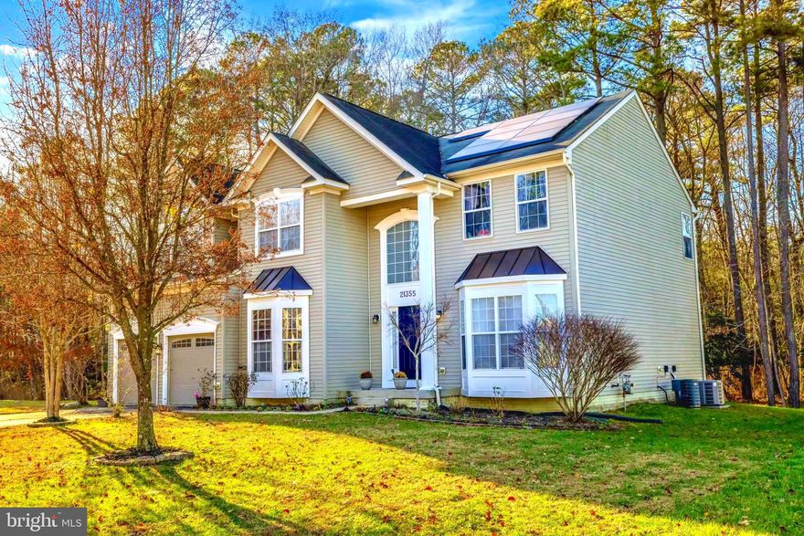 Conveniently located in the desirable South Woods Estates, this exceptional home sits on the largest lot in the neighborhood and offers an abundance of space both inside and out. Just outside Gate 3 of Patuxent River Naval Air Station and minutes from shopping, dining, and everyday conveniences, this location is hard to beat.

Step inside to a stunning two-story foyer filled with natural light, featuring a large front window. The expansive open kitchen is perfect for entertaining and everyday living, showcasing tiled floors and countertops, double ovens, a cooktop, and a sun-filled breakfast area surrounded by windows. The kitchen seamlessly flows into the spacious and inviting family room, complete with a beautiful stone fireplace—ideal for cozy evenings.

The main level also offers a formal dining room with crown molding, comfortably accommodating a table for ten, along with a formal living room, and a convenient half bath.

Upstairs, you’ll find five generously sized bedrooms and two full baths.  The suite includes a walk-in closet and a private en-suite bath with soaking tub, separate shower, and dual vanities. A second-floor laundry room adds everyday convenience.

Storage is plentiful with an oversized, easily accessible crawl space—an uncommon and highly functional feature in this neighborhood—along with an extra-deep two-car garage featuring dual automatic openers and a spacious loft for additional storage.

Outdoors, enjoy a peaceful backyard retreat with organic perennial pollinator gardens offering multi-season color, tiered stone patios, and a storage shed. A small, fenced area provides the perfect space for pets or a play area. Roof-top solar panels significantly reduce electric costs year-round.

Located within close driving distance to Elm’s Beach Park, Point Lookout State Park, and historic St. Mary’s City—this home offers comfort, functionality, and an exceptional lifestyle. Schedule your showing today!