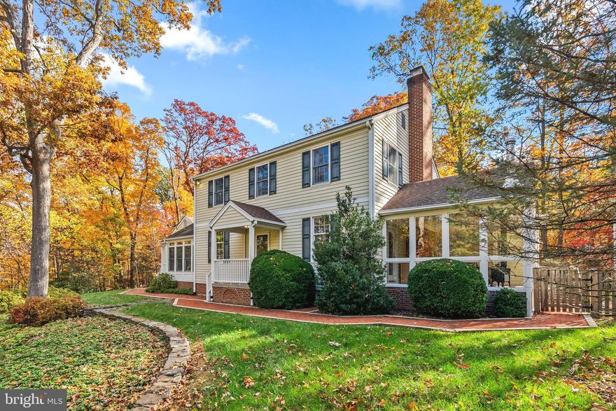 Welcome to 15720 Comus Road, a truly unique custom-built Williamsburg-designed retreat nestled on 3.35 picturesque acres. Lovingly maintained by its original owner and beautifully refreshed for the market. This exceptional home offers over 5,350 finished square feet on the main and upper levels, plus a massive 1,821 unfinished square feet on the lower level, ready for your dream gym, theater, workshop, additional living space, or all of the above! 

Bright, open, and sparkling clean, the home has been thoughtfully updated with fresh paint throughout, including ceilings, refinished hardwood floors, updated lighting, refreshed bathrooms and kitchen, plus new door hardware and hinges throughout. Hardwood flooring extends across both the main and upper levels. Amazing views surround the home, with peaceful wooded scenery out nearly every window and no neighbors peering in, so you can truly enjoy the privacy this property offers.

The flexible floor plan was designed for both everyday comfort and entertaining on a grand scale. The expansive family room and stunning morning room flow seamlessly off the kitchen, creating an incredible gathering space with walls of windows overlooking the serene property. The kitchen is a dream for cooking, hosting, and busy households alike, featuring two ovens, two sinks, breakfast bar seating, a fireplace, and an enormous walk-in pantry.

One of the home’s standout features is the rare dual primary suite layout, with a spacious primary ensuite on the main and upper level. Upstairs also features three additional generously sized bedrooms and a hall bathroom.

The main level includes multiple flexible spaces perfect for home offices, formal dining, rec room, hobbies, or playrooms. A large living room with fireplace opens to the serene sunroom, creating the perfect place to relax and take in the surrounding nature.

Outside, the beautifully landscaped grounds feel like your own private park, complete with mature trees, scenic views, terraced garden areas, and a newly installed brick walkway that wraps around the property. Enjoy the new deck overlooking the backyard, plus a shed with electricity offering great space for hobbies, storage, workshop space, or gardening needs. For added peace of mind, the home is also equipped with a whole-house generator.

Additional highlights include an oversized 3-car garage, huge mudroom and laundry room, dual staircases to the lower level, and stairs leading from the garage to an incredible attic space with amazing storage or future expansion potential.

Surrounded by nature yet still conveniently close to everything Clarksburg has to offer, this one-of-a-kind property delivers the perfect blend of privacy, space, beauty, and functionality.