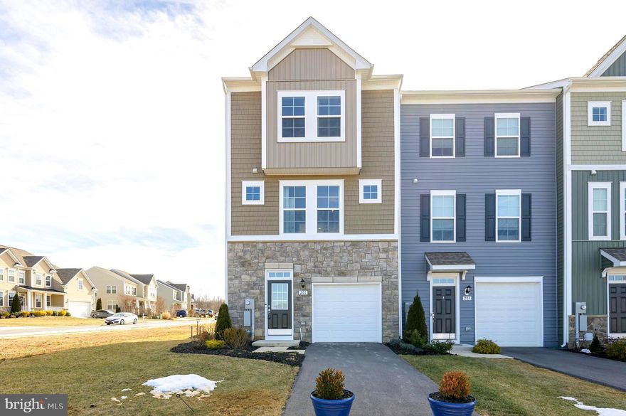 AVAILABLE MARCH 1st! Welcome to your future home! This remarkable end unit FORMER MODEL HOME townhome, available for rent, features a well planned three-levels of finished living space, along with one-car garage. With 4 bedrooms and 3.5 bathrooms, it offers a spacious and comfortable living experience. Step inside and discover a fully finished rec room/ 4th bedroom complete with its own full bathroom. This level also boasts a convenient walkout to sizable rear yard, perfect for outdoor living. Moving up to the main level, you'll be greeted by an inviting open-concept layout. The kitchen steals the show with its beautiful modern cabinets adorned with quartz countertops, an impressive 8-foot island, and stainless steel appliances. The luxurious vinyl plank flooring adds an elegant touch to the entire main level, extending seamlessly from the kitchen to living room. The primary bedroom boasts a walk-in closet, and private ensuite bath. Also featured are two additional bedrooms and full hall bath. Washer and dryer included on bedroom level. This home is designed for both comfort and style, offering the perfect blend of modern amenities and functional spaces. Don't miss out on the opportunity to make this your new home sweet home! Applicant(s) must be able to pass credit/background check. Pets Case by Case with additional pet deposit and rent. Call to schedule your tour! **Furniture does not convey, photos are of the builders model**