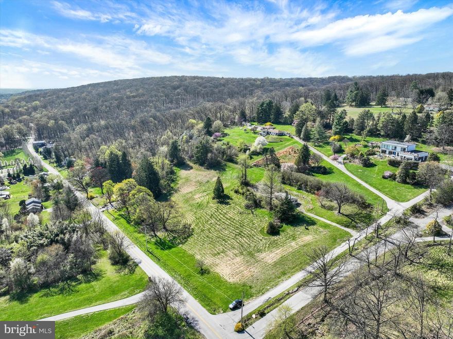 Rare opportunity to own 4.27 scenic acres in the highly desirable Central School District—land like this rarely becomes available! Ideally located near Rocky Ridge Park, this beautiful property offers the perfect blend of privacy, nature, and convenience.

The lot is thoughtfully landscaped with stunning Japanese Lace Maple and Asian Evergreen trees, creating a peaceful and picturesque setting. Enjoy abundant wildlife and breathtaking views that make this property truly special.

A garage on a slab is already in place, providing immediate utility for storage, hobbies, or future building plans. With plenty of space to bring your own builder, this property offers endless potential to create your dream home in a sought-after location.

Whether you’re looking for a private retreat or the perfect place to build, this is a one-of-a-kind opportunity you don’t want to miss.