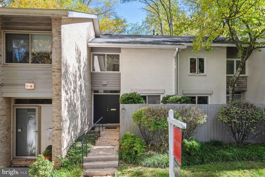 DISREGARD DAYS ON THE MARKET! THIS SPACIOUS TOWNHOME IS NESTLED IN THE TREES OFF THE BEATEN  PATH! BEAUTIFULLY MAINTAINED BY ITS LONG-TIME OWNER. JUST RECEIVED A FRESH COAT OF PAINT, AND NEWLY FINISHED WOOD FLOORS  ON  THE MAIN LVL. ENJOY THE FIREPLACE,, SKYLIGHT, AND FULLY FINISHED  WALKOUT  LOWER LEVEL.  YJTRR FULL AND ONE-HALF BATHS. 2 OUTDOOR AREAS  FOR YOUR ENJOYMENT. A PRIVATE   COURTYARD OFF THE KITCHEN AND A STONE PATIO ON THE LOWER LEVEL, 

 BRING YOUR VISION OF MID CENTURY MODERN TO THIS BEAUTY AND CREATE YOUR DREAM