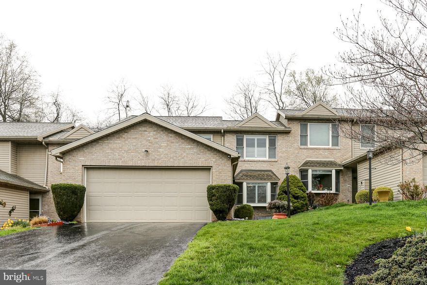 You will be amazed at the space and the amenities of this uniquely designed townhome located in the Susquehanna Twp townhome community of Gateway Court!   The home boasts over 2,000 square feet of living space not counting the finished area in the lower level! Features include a large kitchen with loads of cupboards and counterspace, a breakfast bar, double ovens, skylight, and island cooktop range.  Across from the kitchen is a formal dining room with wood floors and large window, and down the hall is a half bath for guests.  The huge great room, with wood floors, vaulted ceiling and electric fireplace for ambiance and warmth, is great for entertaining and has a door that leads out to a private deck for summer relaxation.  There is also a main level primary suite with wood floors, a wall of closets, and a fabulous bathroom. Off of the kitchen is a convenient laundry room with access to a large1.5 car garage.  The second level has two very large bedrooms, both with luxury vinyl plank floors and there is a second floor bath as well.  As an added bonus, much of the basement has been finished into a large family room, giving even more living space! There is a lot of additional unfinished  basement space for storage, and great closet space throughout the home.  Additionally, five skylights insure lots of natural light throughout the home!  Tasteful plantation blinds have been installed throughout the house.   This home is well priced and will not last! Schedule your tour today and see the value for yourself!   For buyers' peace of mind, the seller is generously including a one-year HSA home warranty!  Don't delay!