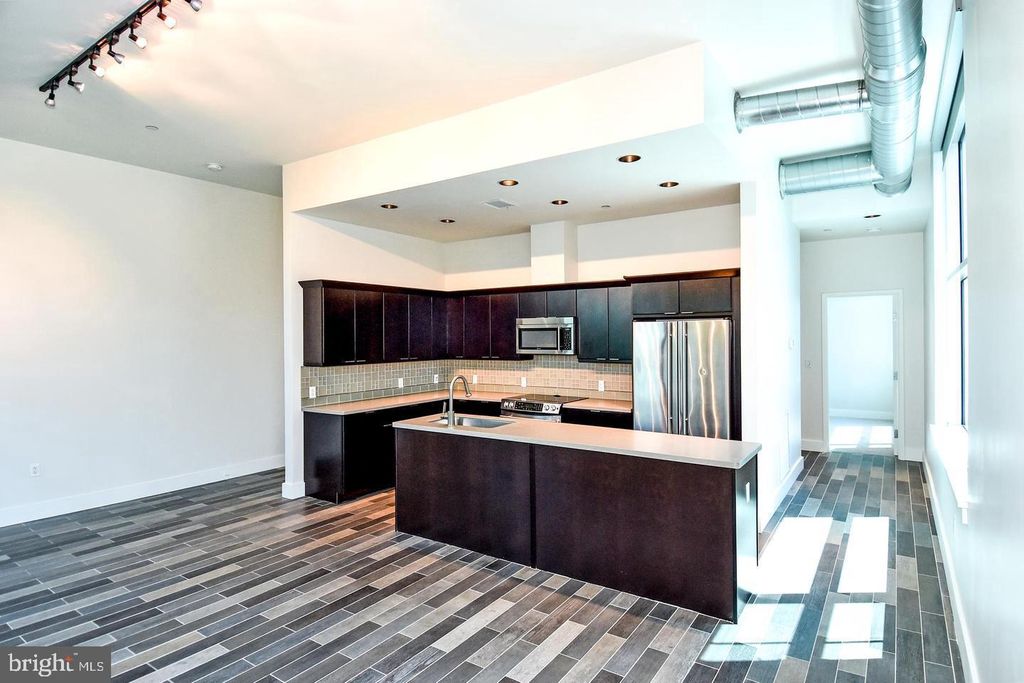 Photo of 7809 Woodmont Avenue #3A, BETHESDA, MD 20814 (MLS # MDMC2206322)