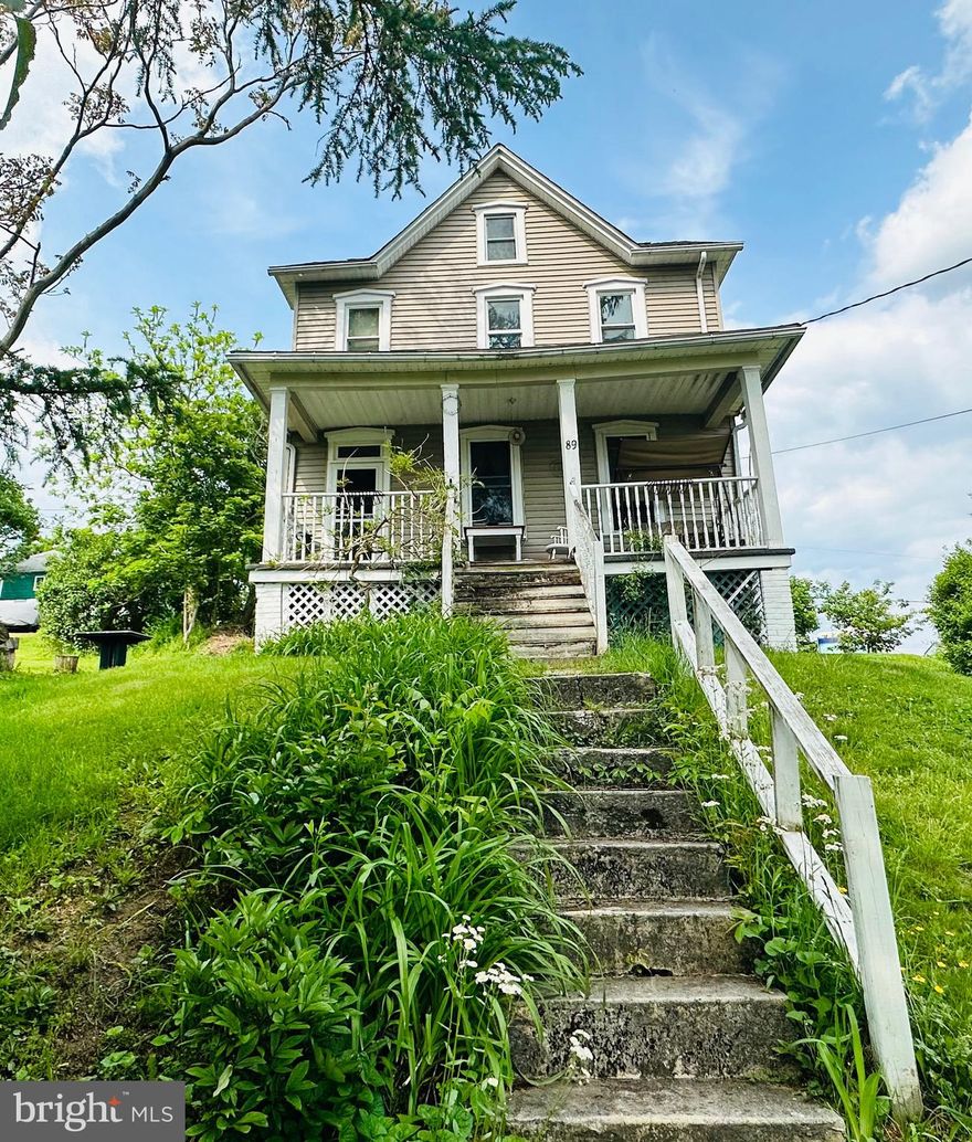 Welcome to your new home on Ormand street! This house on the hill has beautiful views of the mountains of Frostburg from the upstairs bedrooms. As you enter the property through the front yard you will see pear trees and tall pines, the sidewalk takes you to the cozy front porch, perfect for a porch swing to enjoy the evenings. The 3-4 bedroom/ 2 full bath house is huge with plenty of space for a family. The rooms are spacious with 9 ft ceilings. Full of charm and potential. 
The roof was replaced in November 2022, siding on 2 sides of the house in March 2023 and new doors and windows in 2019.