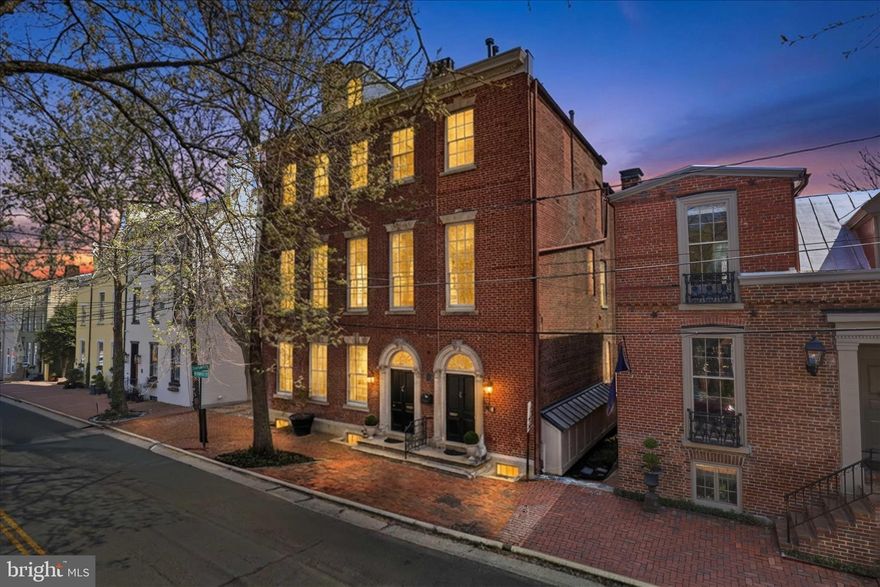 COMING SOON! All showings can begin on 4/9, and OPEN THIS Sat & Sun 4/11 & 4/12 from 12p-3p!
Live inside a piece of American history—where 18th-century architecture meets refined modern luxury in the heart of Old Town Alexandria!

Welcome to 209-B N. Fairfax Street, an extraordinary 2BR, 2-1/2BA luxury condominium nestled within an historic Georgian-style townhouse. One of only 3 residences in this remarkable building, this home offers an exceedingly rare opportunity to own a piece of Alexandria’s storied past while enjoying beautifully updated interiors designed for modern living.

The historic property—once known as part of the Jonah Thompson Houses—has served many roles over the centuries, including a female seminary in the 1840s and a Civil War-era hospital, reflecting the deep historical fabric of Old Town Alexandria. Today, it stands restored as an intimate and elegant residential enclave.

Inside, timeless architectural character blends seamlessly with thoughtful renovations. Soaring ceilings, expansive windows with unique, recessed pocket shutters, and historic detailing create a sense of scale and sophistication rarely found in condominium living. The gracious living room and dining room—both featuring elegant gas fireplaces—are ideal for entertaining, as is the well-appointed kitchen featuring brand new appliances, including a double oven and wine fridge. The main-level powder room also adds convenience for guests.

When it’s time to relax and recharge, the 2 luxurious bedrooms—each with its own en-suite bathroom—provide comfort and privacy. The primary bedroom also features its own private sitting room, 4 closets, and a luxurious bathroom with dual sinks, jetted soaking tub, and custom, marble walk-in shower.

Perfectly positioned in the heart of Old Town Alexandria—and boasting a highly-coveted deeded, off-street parking space—this home is just moments from the Potomac River waterfront; King Street’s renowned dining and boutiques; historic landmarks; and charming cobblestone streets. Nearby parks, marinas, and walking paths provide a quintessential Old Town lifestyle.

Residents also enjoy convenient access to Washington, D.C., Reagan National Airport, Amazon HQ2, and major commuter routes, making this an ideal home base for both city living and travel.

Historic and elegant, 209-B N. Fairfax Street offers the chance to own a truly distinctive legacy residence. Come live where centuries of history meet modern luxury in one of the most coveted addresses in Northern Virginia.