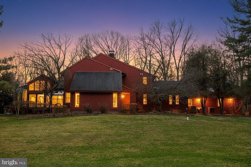 This Owings Mills Contemporary will WOW you! You have to see this amazing, almost 5000sqft updated & upgraded 4/5 Bedroom & 6 Bathroom home for yourself. It is like 2 homes in 1, beautifully designed for todays living, with its ground level (attached but separate) "In-Law Apartment Suite" that is perfect for the multi-generational family! This Home boasts Two Driveways, Main Entry Hall and a private In-Law Entrance, 2 Full Open Concept "eat-in" Kitchens, 4-5 Bedrooms (2 Primary Suites), Walk-in Closet, 4 Full and 2 half Bathrooms, 2 Living Rooms, Formal Dining Room, Solarium, Family Room with Wet Bar & Double sided Fireplace it shares with the Kitchen, Mud room/Laundry Area, Finished Basement Rec Room w/Fireplace and a Full Bath, Over-Sized 2 Car Carport, Multiple Outdoor Living/Entertaining Areas, and an Inground Heated Salt-Water Pool! Some of the many updates and upgraded features of this home include: New Wood Flooring throughout, High/Cathedral Ceilings, Granit/Stone Counters, new and updated Custom Stone/Tile Bathrooms, Stainless Steel Appliances, Ceiling fans, 4 zone HVAC, Huge Deck perfect for entertaining, and Situated on a secluded 1.09 acre lot. You have plenty of privacy on this very quiet street!  Located off beautiful Greenspring Ave, it has easy access to I-83, I-695, and I-795, and only minutes to Hunt Valley Town Center Shopping! This home will not disappoint! Schedule to see it TODAY!