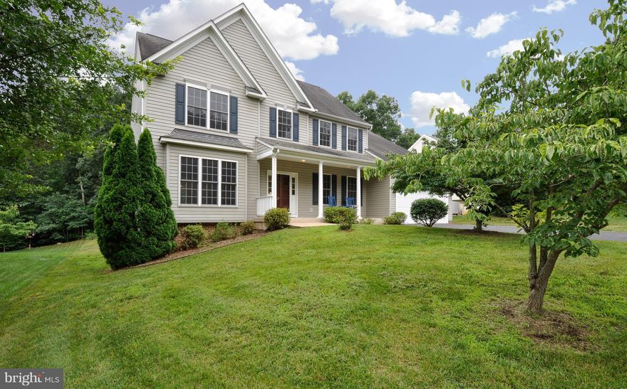 Move Right In! Fabulous 4 Bedroom colonial with over 4200 square feet finished! NEW paint and NEW carpeting throughout*14 x 11 sun room*2 fireplaces*19 x 14 MBR suite with 14 x 10 sitting room, fireplace, walk in closet and large MBA*Fully finished walkout basement with rec room, full bath, office, and huge storage area*Front porch, 14 x 11 covered patio AND deck!Level 1/2 acre lot*Walk to pool!