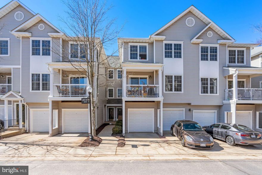 If location is everything to you, then this fully UPDATED 2 Bedroom Condo is a MUST SEE! Located close to Fair Lakes Shopping Center, major commuter routes, shopping,  restaurants and within 10 miles of the Dulles Airport.  Pride in ownership is on display everywhere you look in this home.  Beautifully updated kitchen with stainless appliance, granite counters, large Farmhouse stainless sink, recessed lighting and more.  The main level also features gorgeous hardwood laminate flooring, crown molding, gas fireplace with mantle, washer & dryer and sliding glass door to your private balcony.  Upper level has large Owner's Suite with vaulted ceilings, walk in closet, and updated private bathroom with oversized walk-in shower with glass doors.  Second bedroom also of good size with expansive walk in closet.  Centrally located full bath with tub/shower also nicely updated. Recent updates include Hot Water Heater, Flooring. Bathroom upgraded, kitchen updates, and more! Amenities include Pools, Clubhouse, Exercise Room and gated community.