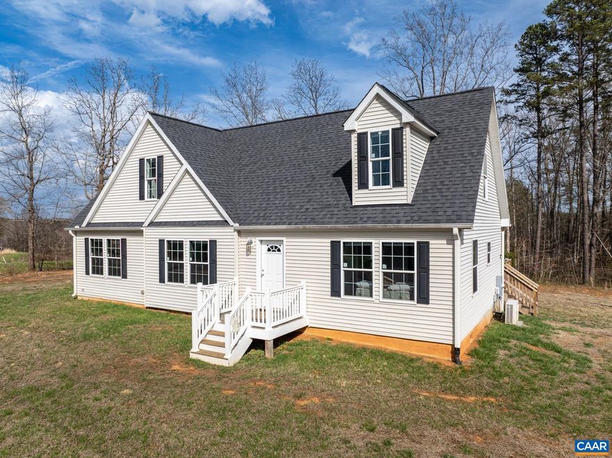 This charming 4-bedroom, 3-bath Cape Cod sits on a picturesque one-acre lot, offering both space and comfort. The entire second floor serves as a private primary  suite, providing a serene retreat with generous room for relaxation.  There is also a primary suite on the main floor, plus two additional guest rooms. The home features a large, well-appointed kitchen with all appliances included, perfect for cooking and entertaining. A convenient main-floor laundry room with stack washer/dryer adds everyday ease. The laundry room size allows for side by side washer and dryer as well.  With a two-zone heat pump system ensuring year-round comfort and efficient climate control, this home blends classic style with modern functionality?ideal for families or anyone seeking a peaceful setting with plenty of room to grow.,Formica Counter,White Cabinets