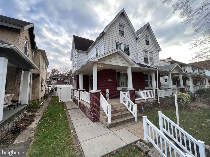 Check out this lovely Brick 5-bedroom home with classic charm and modern updates. Generous-sized living/Dinning room and Kitchen Space. Beautiful moldings, wrap-around front porch, vinyl railings,  Great back yard, new 6 ft. vinyl privacy fencing, rear 2 car parking pad, and patio.  Convenient, charming community.  Great location for Maryland commuters close to I-83. Free 1-Year HSA HOME WARRANTY included.  Don't delay scheduling your showing appointment today!