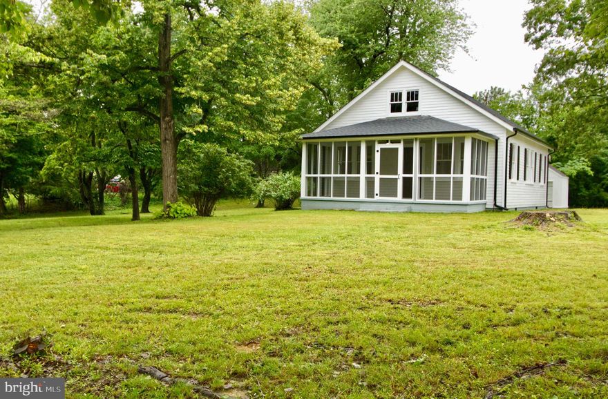 PRICE ADJUSTMENT-
Don't miss out on this opportunity - 3.75 acres with multi-purpose use. Zoned Residential, Commerical and Industrial.  This 2-bedroom, 1 bath home has been totally renovated with new flooring, freshly painted, light fixtures & updated kitchen.  New HVAC 2025. Shed behind house.  Two additional building provide lots of storage or would make a great workshop, has electric. A lot of good road frontage for your business. Live where you work.