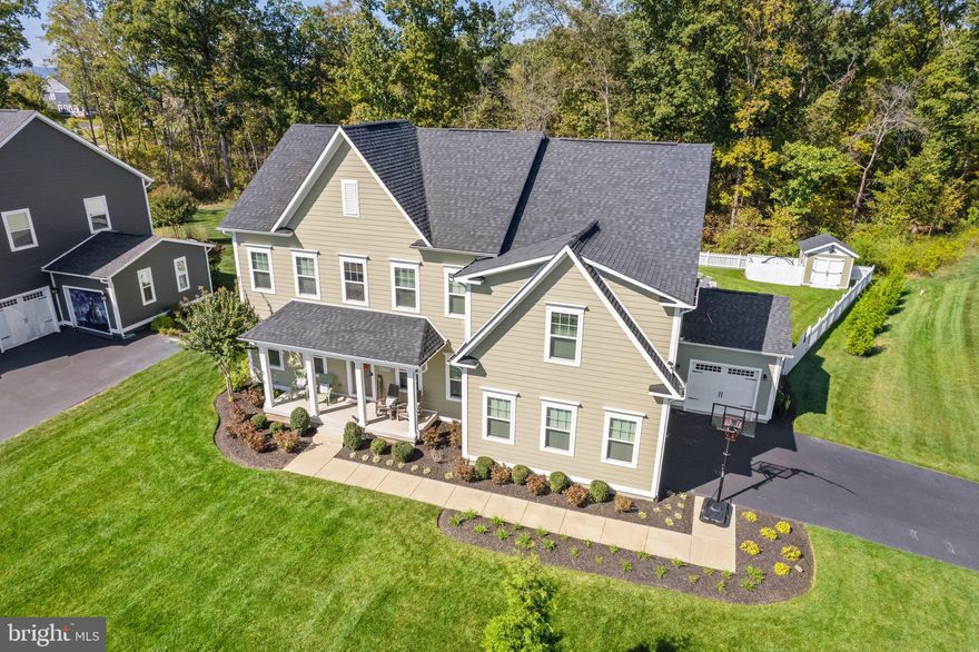 Presenting an exquisite 3-level home with a 3-car side-load garage and stunning hardwood flooring throughout the main and upper levels. The upper level boasts a spacious loft which can be used as an additional entertainment area, study room, hobby room or just a quiet get away! The   laundry area is conveniently located on the bedroom level. The primary bedroom features  a tray ceiling with wood molding,  closets and a  large bath, complete with dual rainfall showerhead in an oversized shower and a separate water closet and linen closet. The second bedroom enjoys a private bath, while the third and fourth bedrooms share a bath with a double vanity.


The kitchen boasts an oversized quartz island and offers a captivating view of the 18 x 36 in-ground saltwater pool, complete with a 10x10 wading area. Surrounding the pool is a stunning travertine deck, complemented by multiple tiered composite decking. The kitchen  seamlessly connects to the family room, featuring a cozy fireplace making the kitchen a true gathering area. Moreover, the main level includes formal living and dining rooms, an entry through a mudroom from the three-car garage, and a convenient half bath.

The finished lower level boasts a full bath, a well-appointed finished recreation room, and two areas yet to be customized, with one perfect for conversion into an office or guest space, catering to your personalized needs. Additionally, it features walk-up stairs leading to the fenced backyard, providing easy access and a secure, private outdoor area, to include the salt water pool.

All of this is situated within the award-winning Willowsford community, renowned for its nature conservation areas, dog park, kayaking and boating opportunities, a family campground, farmers' market, and community garden space. With over 40 miles of paths, the community offers a resort-style lodge featuring a splash pad, pool, and an Olympic-sized pool for residents to enjoy. Social activities and classes are offered throughout the year making this Luxury Living a True Lifestyle.